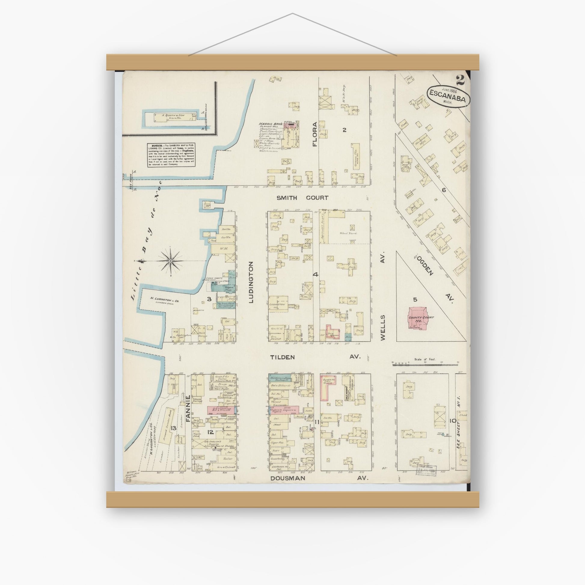 Old map wall art mockup — magnetic wood frame on white wall — Sanborn Fire Insurance Map from Escanaba, Delta County, Michigan (1884), Sheet #0002