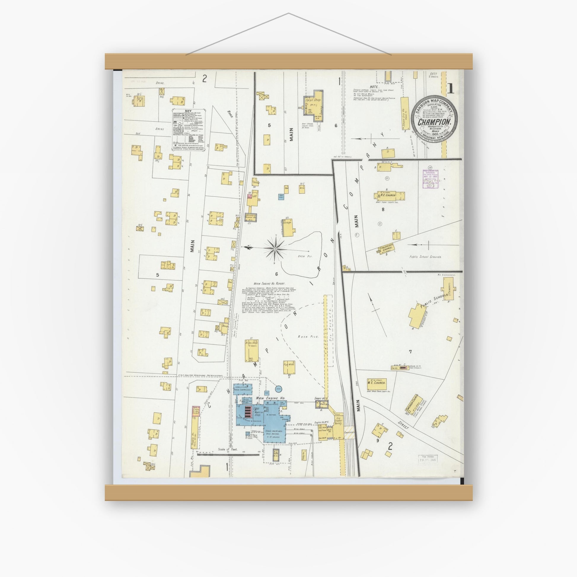 Old map wall art mockup — magnetic wood frame on white wall — Sanborn Fire Insurance Map from Champion, Marquette County, Michigan (1902), Sheet #0001