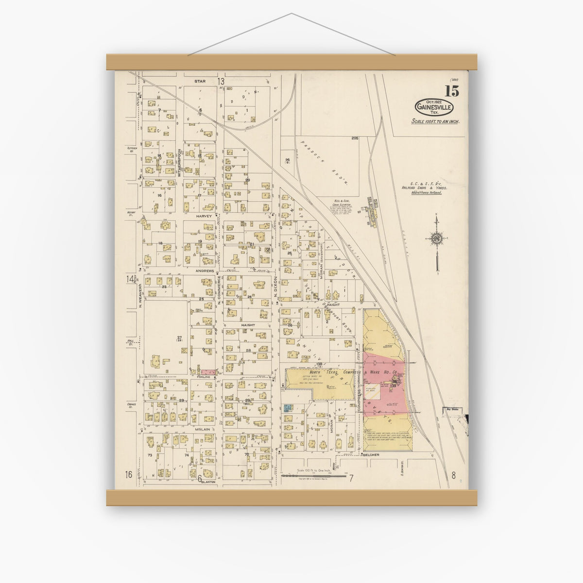 Old map wall art mockup — magnetic wood frame on white wall — Sanborn Fire Insurance Map from Gainesville, Cooke County, Texas (1922), Sheet #0015