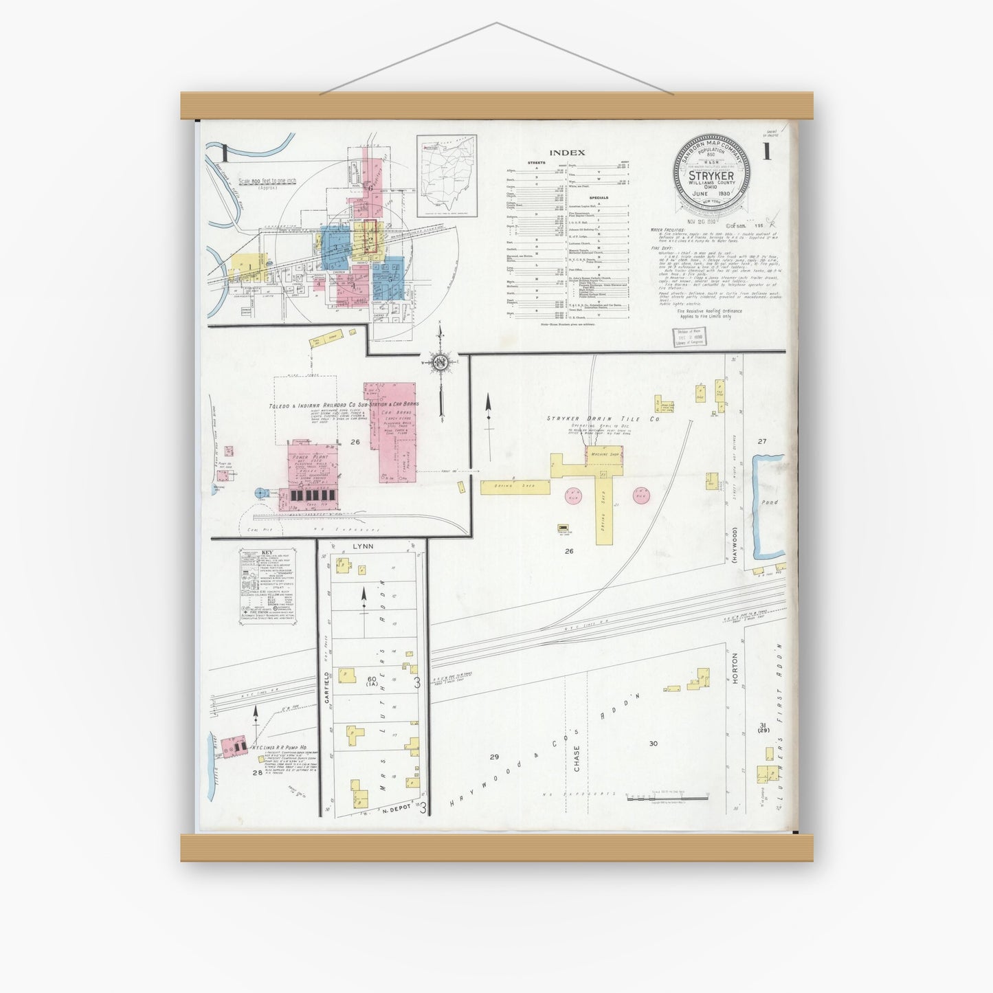 Old map wall art mockup — magnetic wood frame on white wall — Sanborn Fire Insurance Map from Stryker, Williams County, Ohio (1930), Sheet #0001