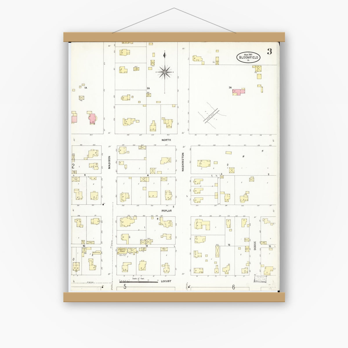 Old map wall art mockup — magnetic wood frame on white wall — Sanborn Fire Insurance Map from Bloomfield, Davis County, Iowa (1907), Sheet #0003