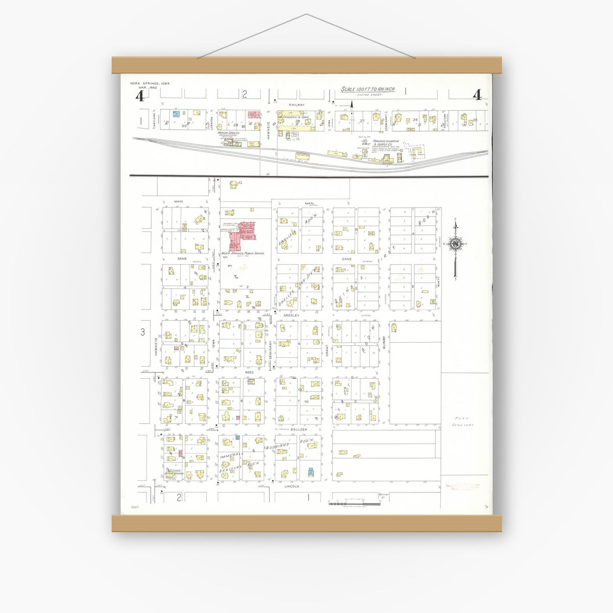 Old map wall art mockup — magnetic wood frame on white wall — Sanborn Fire Insurance Map from Nora Springs, Floyd County, Iowa (1942), Sheet #0004