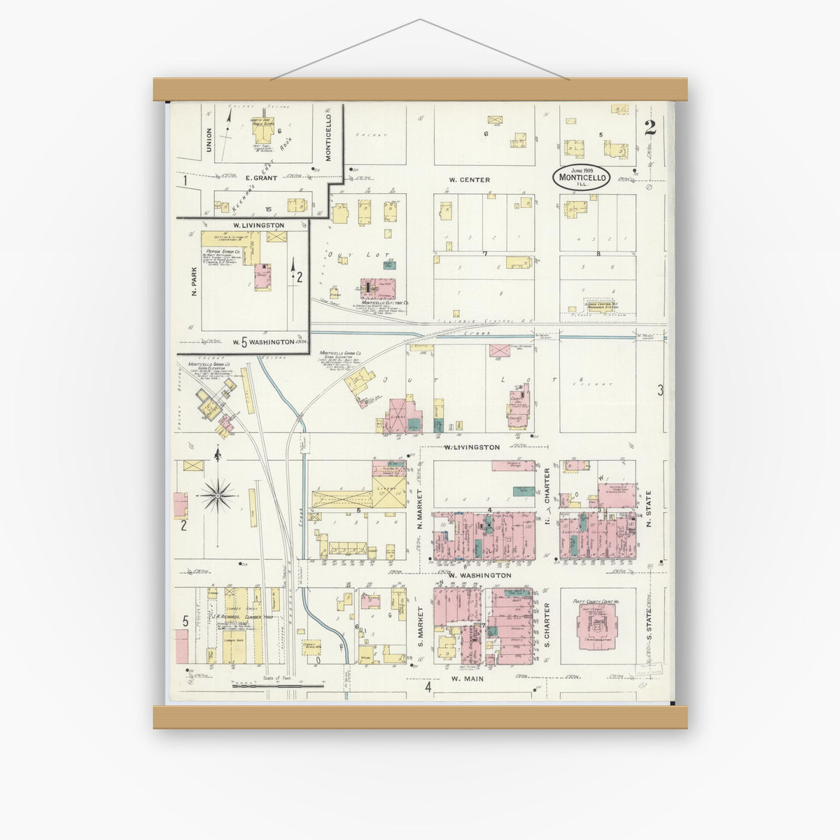 Old map wall art mockup — magnetic wood frame on white wall — Sanborn Fire Insurance Map from Monticello, Piatt County, Illinois (1909), Sheet #0002