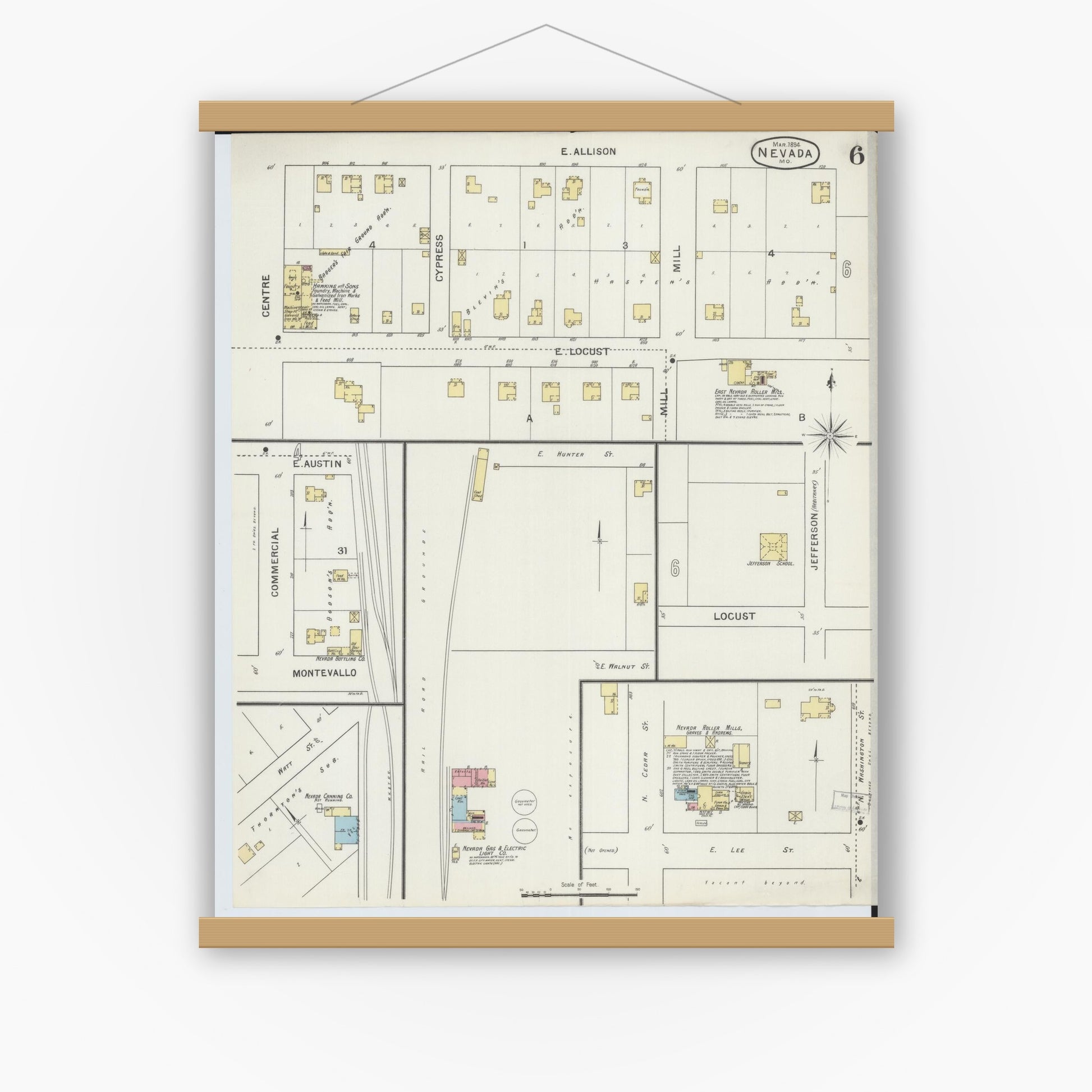 Old map wall art mockup — magnetic wood frame on white wall — Sanborn Fire Insurance Map from Nevada, Vernon County, Missouri (1894), Sheet #0006