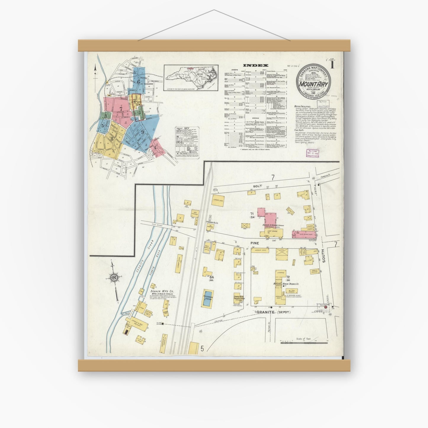 Old map wall art mockup — magnetic wood frame on white wall — Sanborn Fire Insurance Map from Mount Airy, Surry County, North Carolina (1916), Sheet #0001
