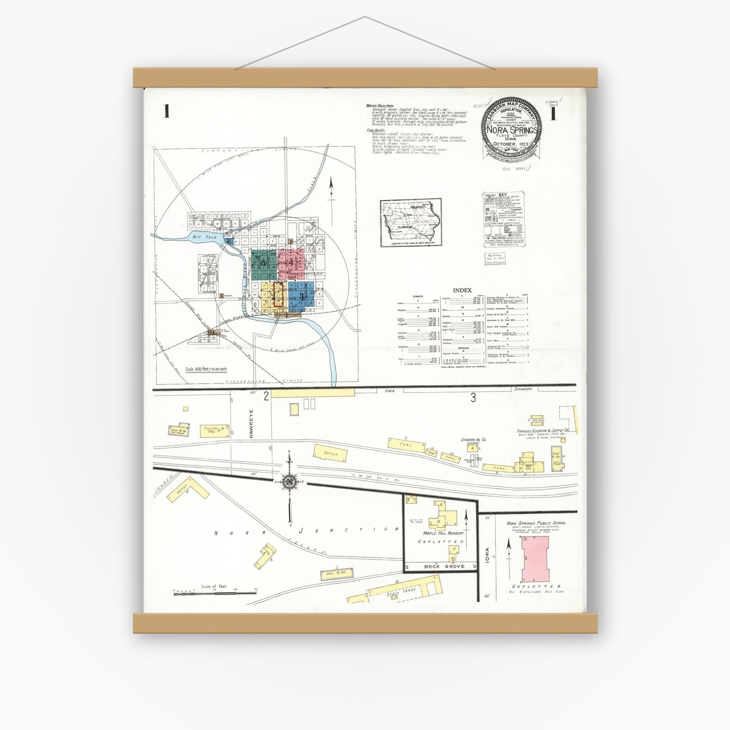 Old map wall art mockup — magnetic wood frame on white wall — Sanborn Fire Insurance Map from Nora Springs, Floyd County, Iowa (1923) â€” Complete Set