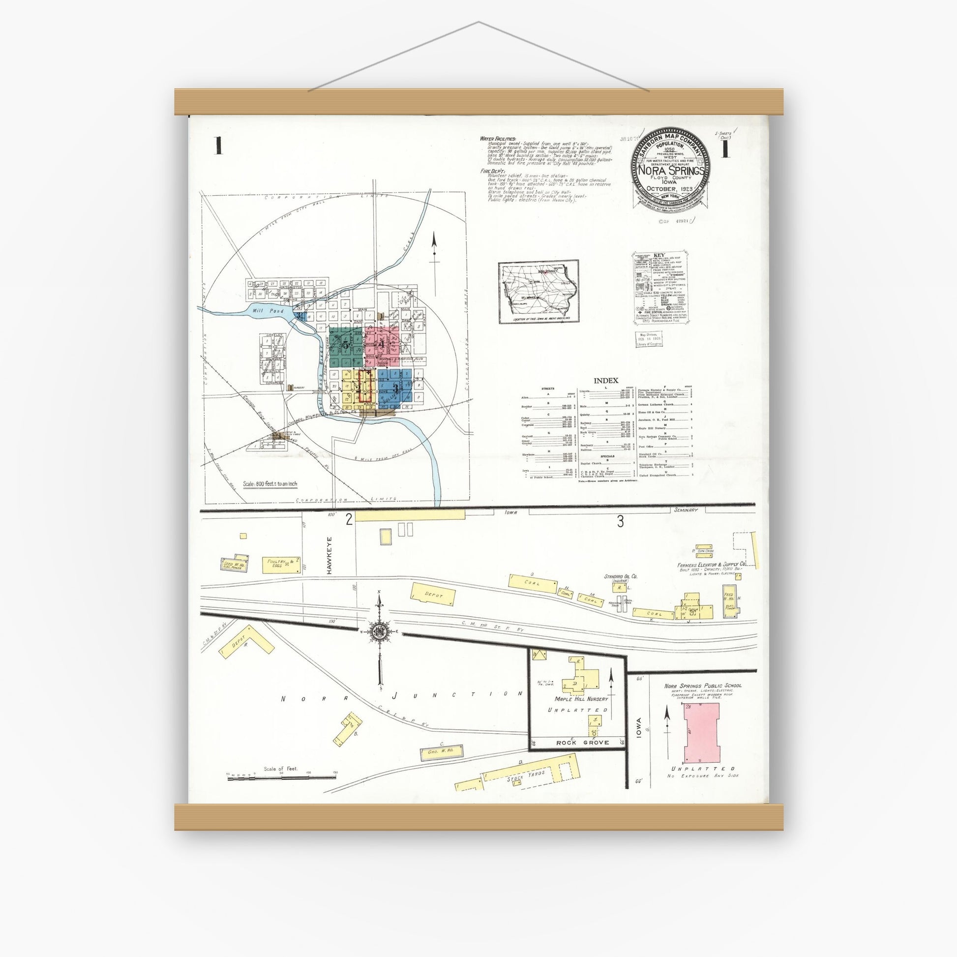 Old map wall art mockup — magnetic wood frame on white wall — Sanborn Fire Insurance Map from Nora Springs, Floyd County, Iowa (1923) â€” Complete Set