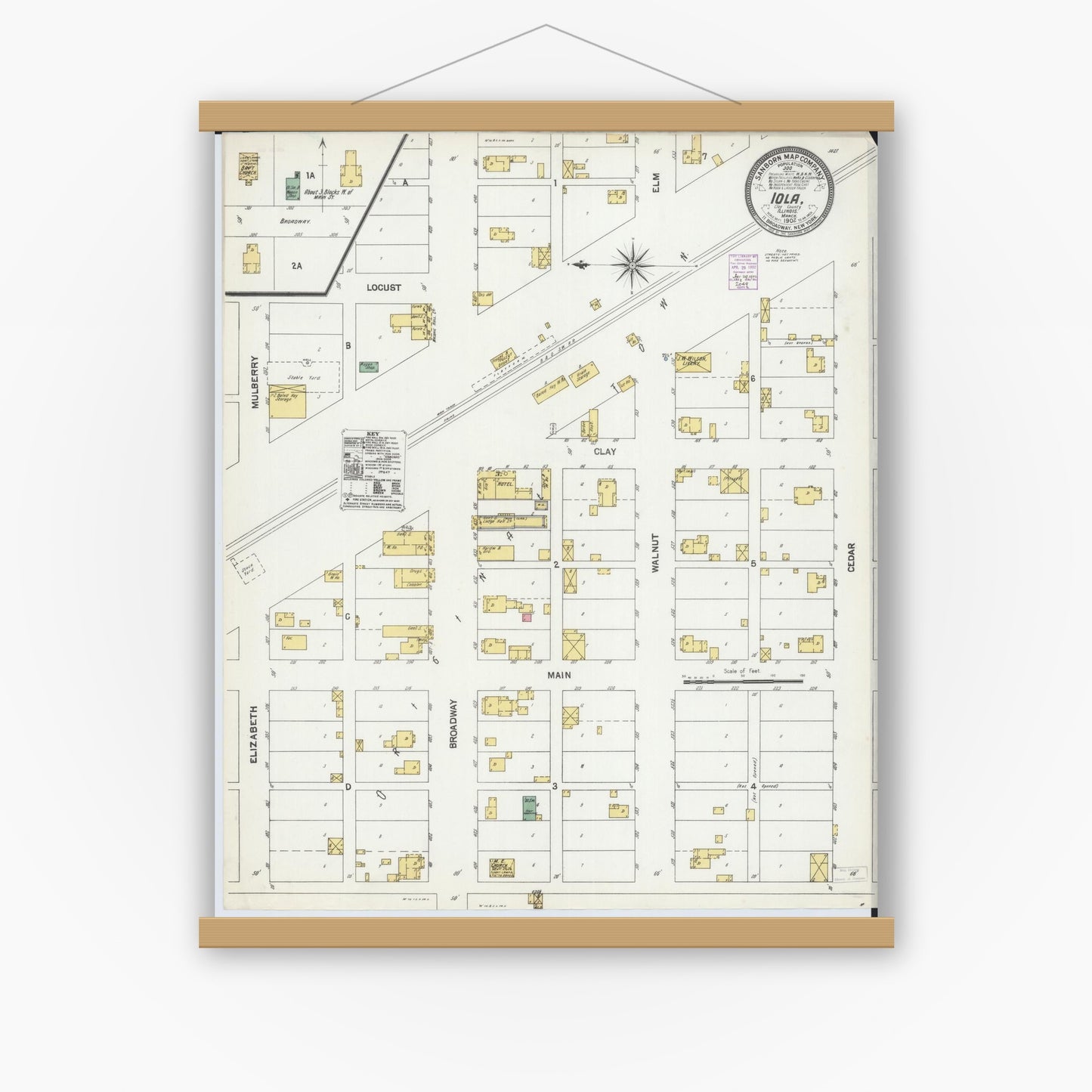 Old map wall art mockup — magnetic wood frame on white wall — Sanborn Fire Insurance Map from Iola, Clay County, Illinois (1902), Sheet #0001