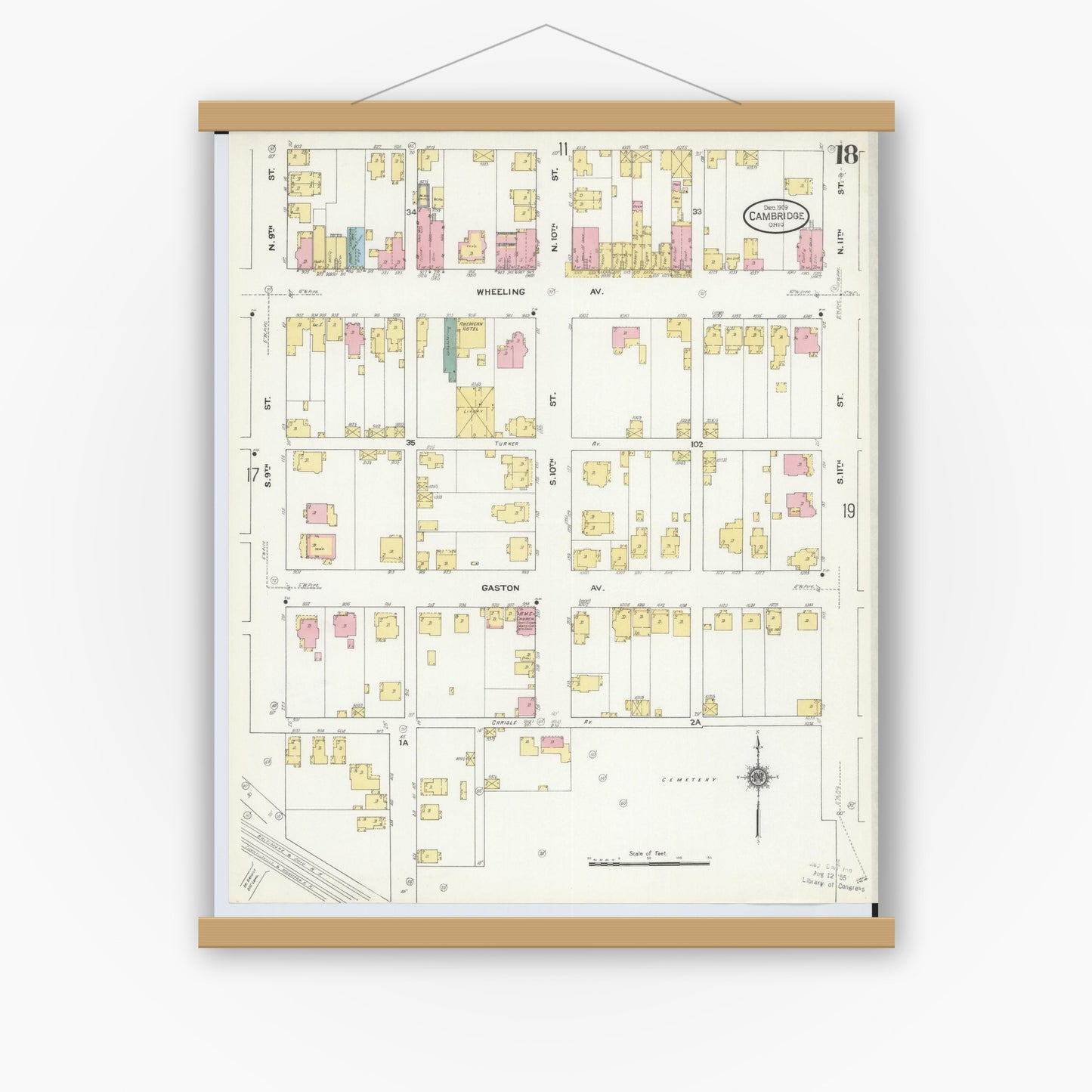 Old map wall art mockup — magnetic wood frame on white wall — Sanborn Fire Insurance Map from Cambridge, Guernsey County, Ohio (1909), Sheet #0018