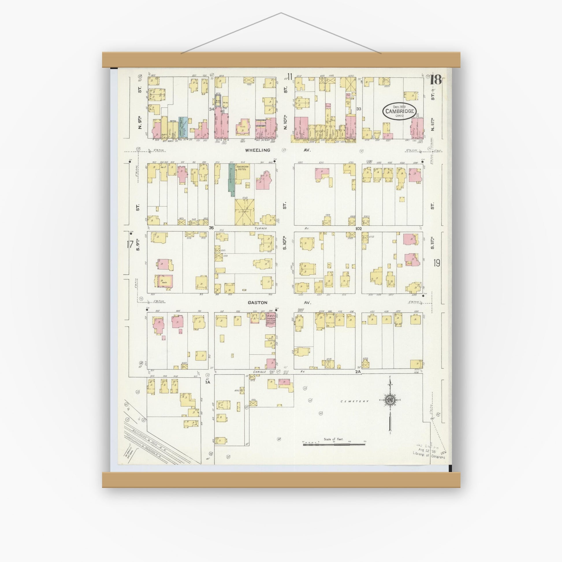 Old map wall art mockup — magnetic wood frame on white wall — Sanborn Fire Insurance Map from Cambridge, Guernsey County, Ohio (1909), Sheet #0018