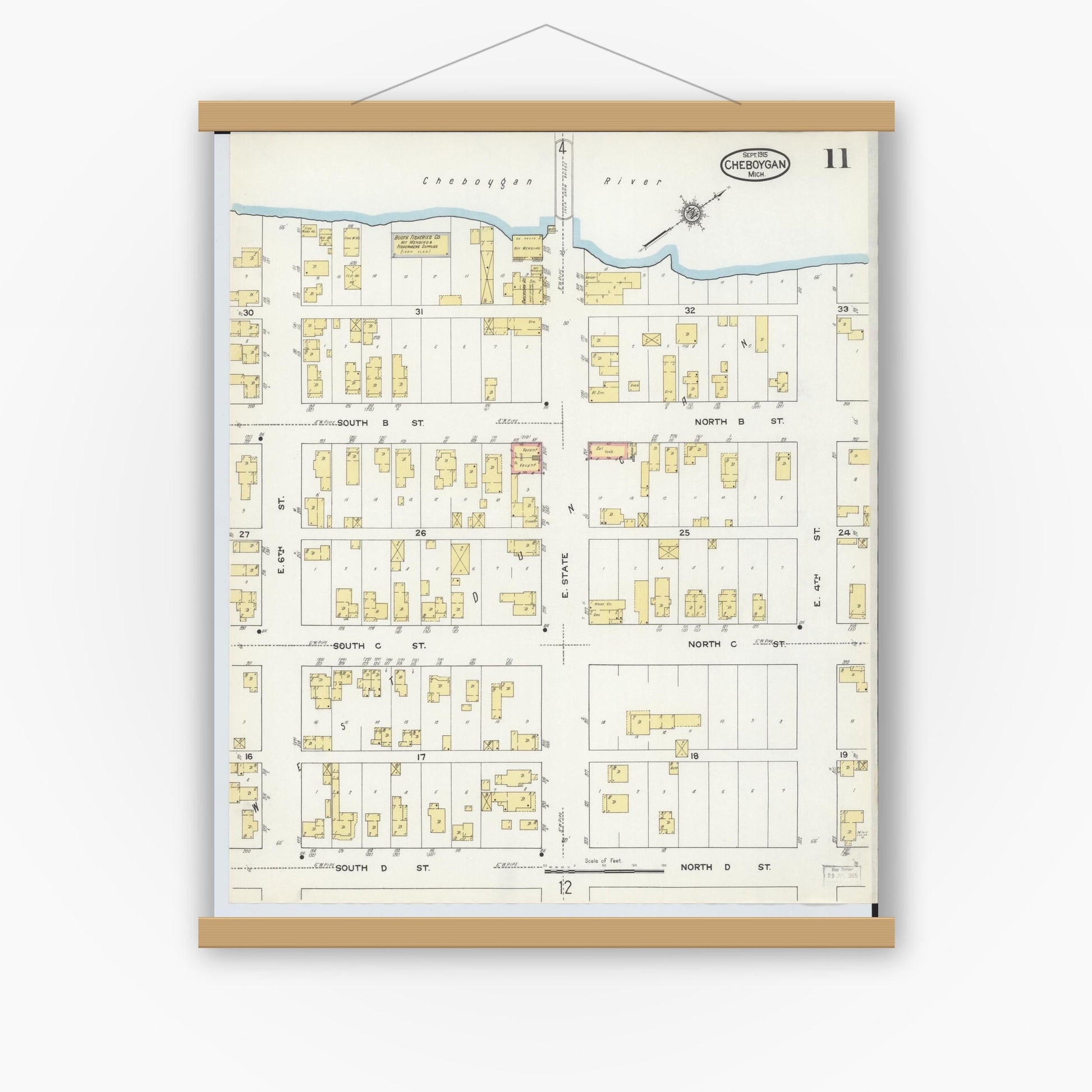 Old map wall art mockup — magnetic wood frame on white wall — Sanborn Fire Insurance Map from Cheboygan, Cheboygan County, Michigan (1915), Sheet #0011