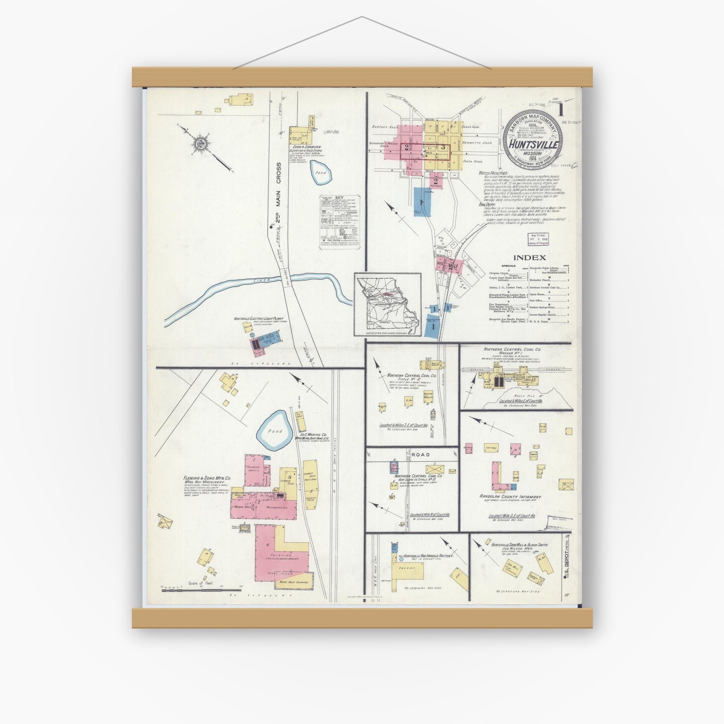Old map wall art mockup — magnetic wood frame on white wall — Sanborn Fire Insurance Map from Huntsville, Randolph County, Missouri (1916), Sheet #0001