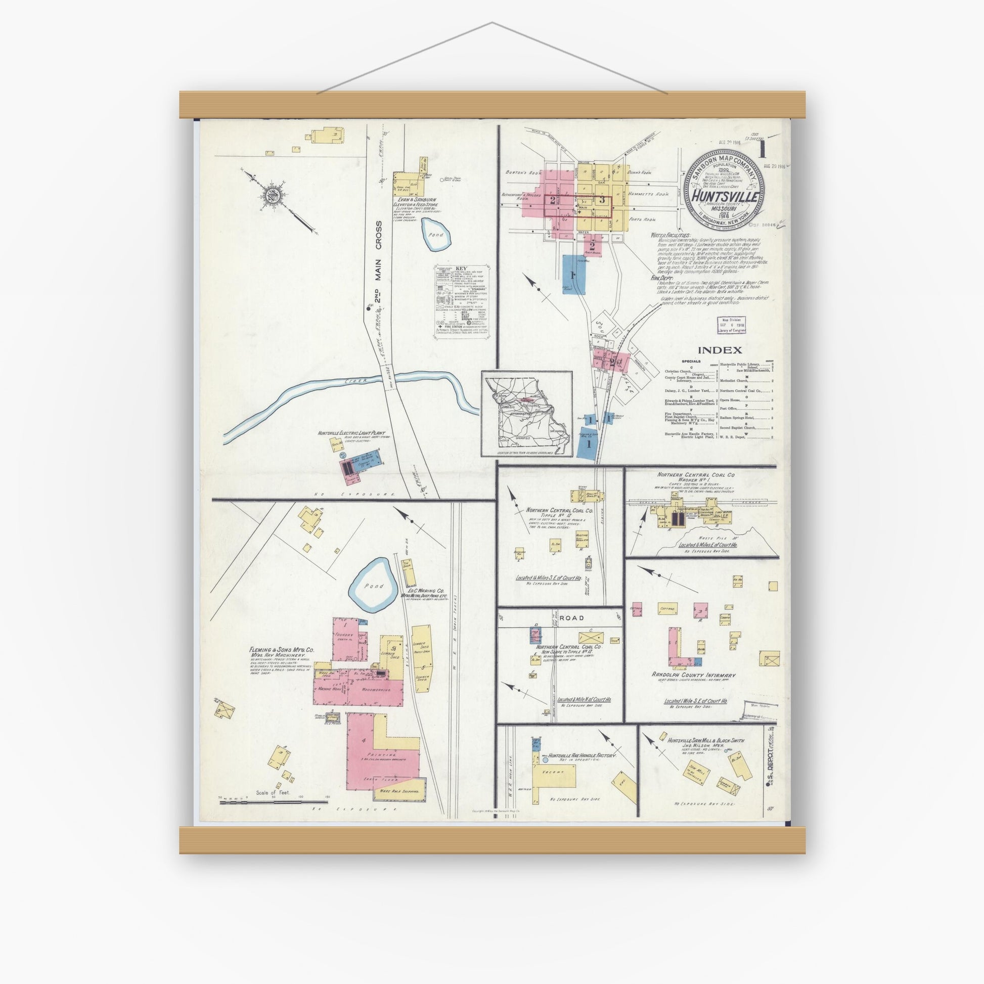 Old map wall art mockup — magnetic wood frame on white wall — Sanborn Fire Insurance Map from Huntsville, Randolph County, Missouri (1916), Sheet #0001