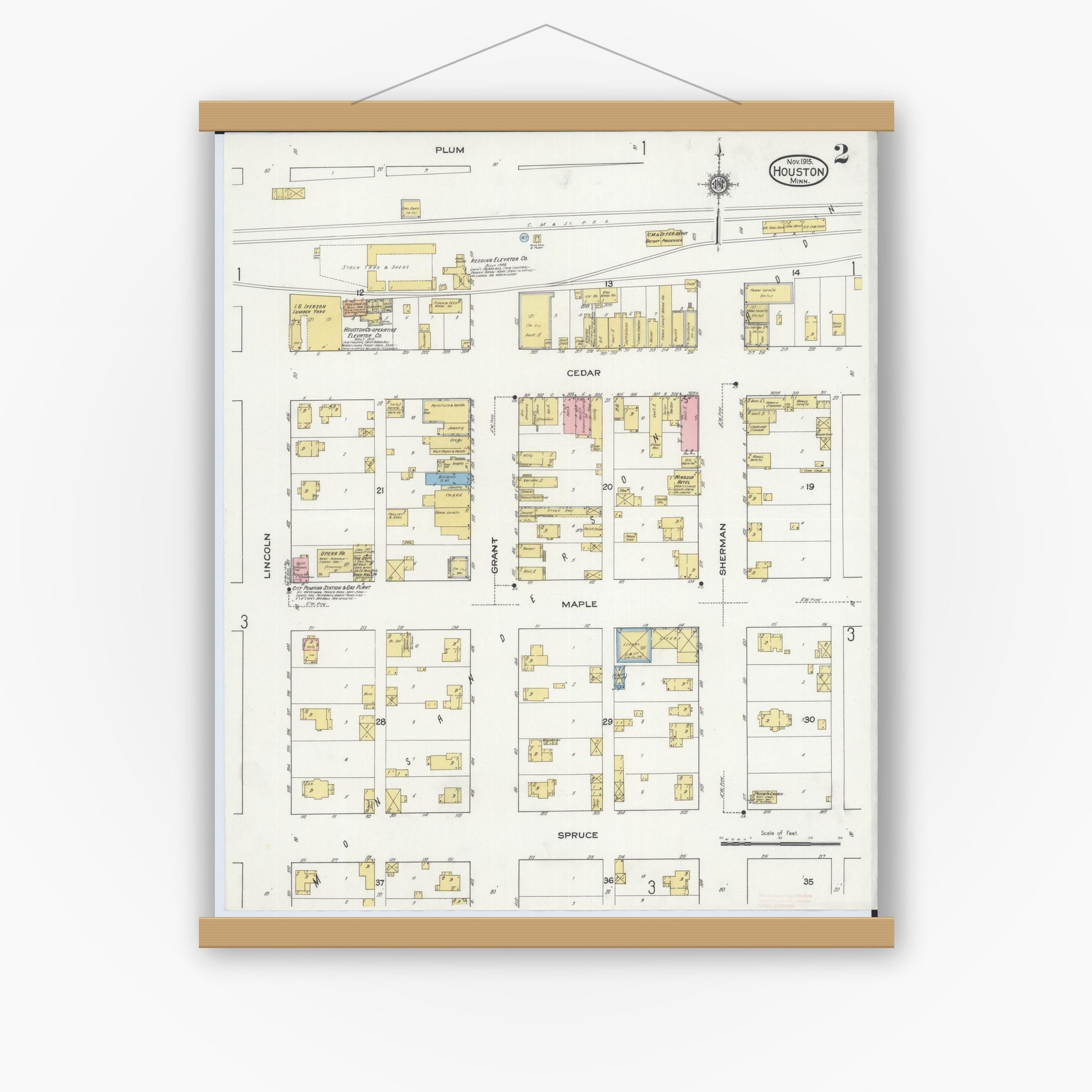 Old map wall art mockup — magnetic wood frame on white wall — Sanborn Fire Insurance Map from Houston, Houston County, Minnesota (1915), Sheet #0002