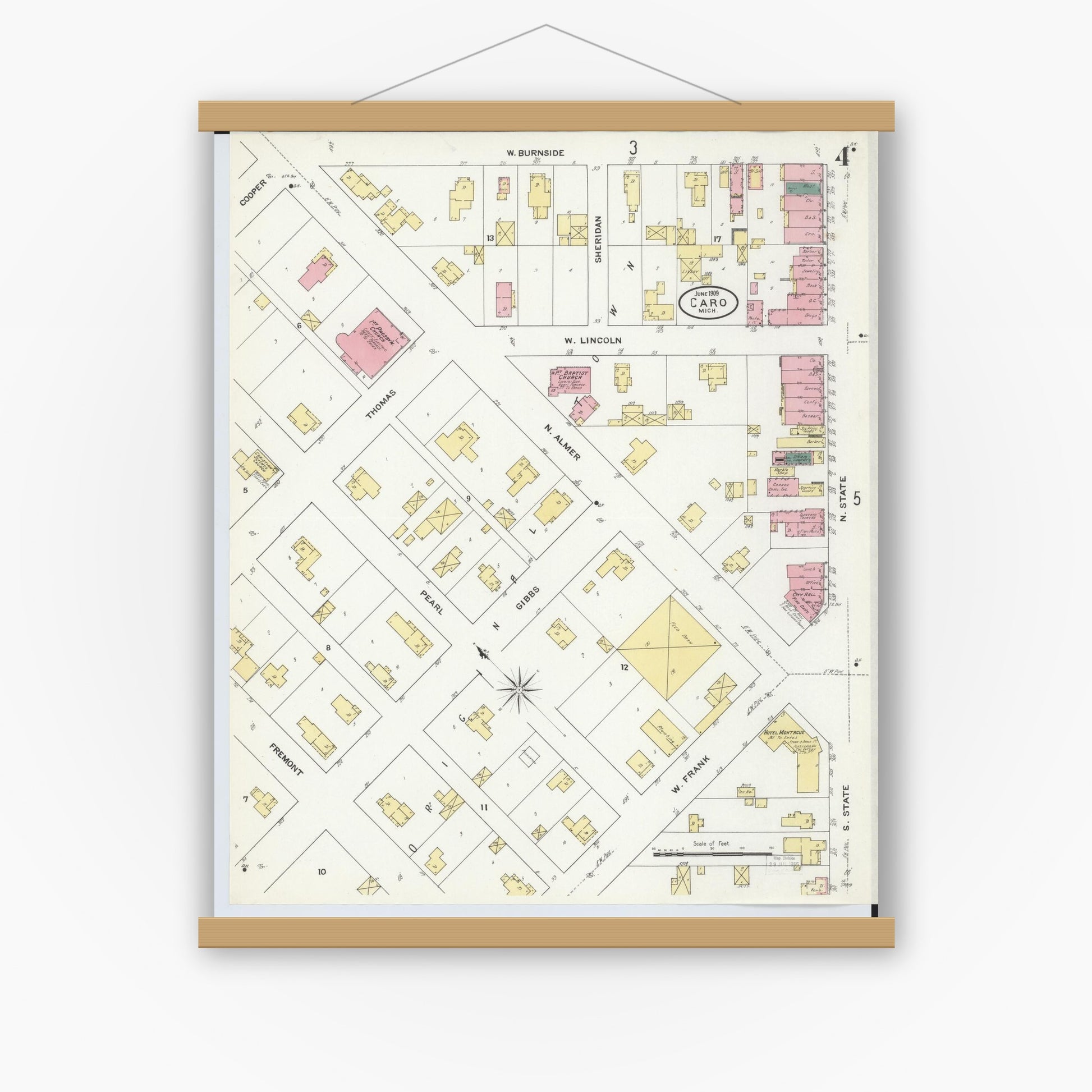 Old map wall art mockup — magnetic wood frame on white wall — Sanborn Fire Insurance Map from Caro, Tuscola County, Michigan (1909), Sheet #0004