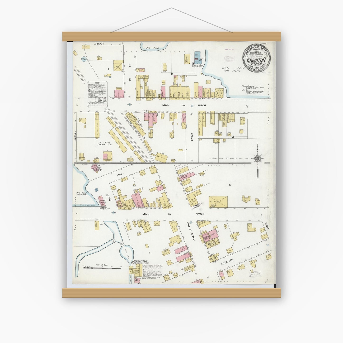 Old map wall art mockup — magnetic wood frame on white wall — Sanborn Fire Insurance Map from Brighton, Livingston County, Michigan (1910), Sheet #0001
