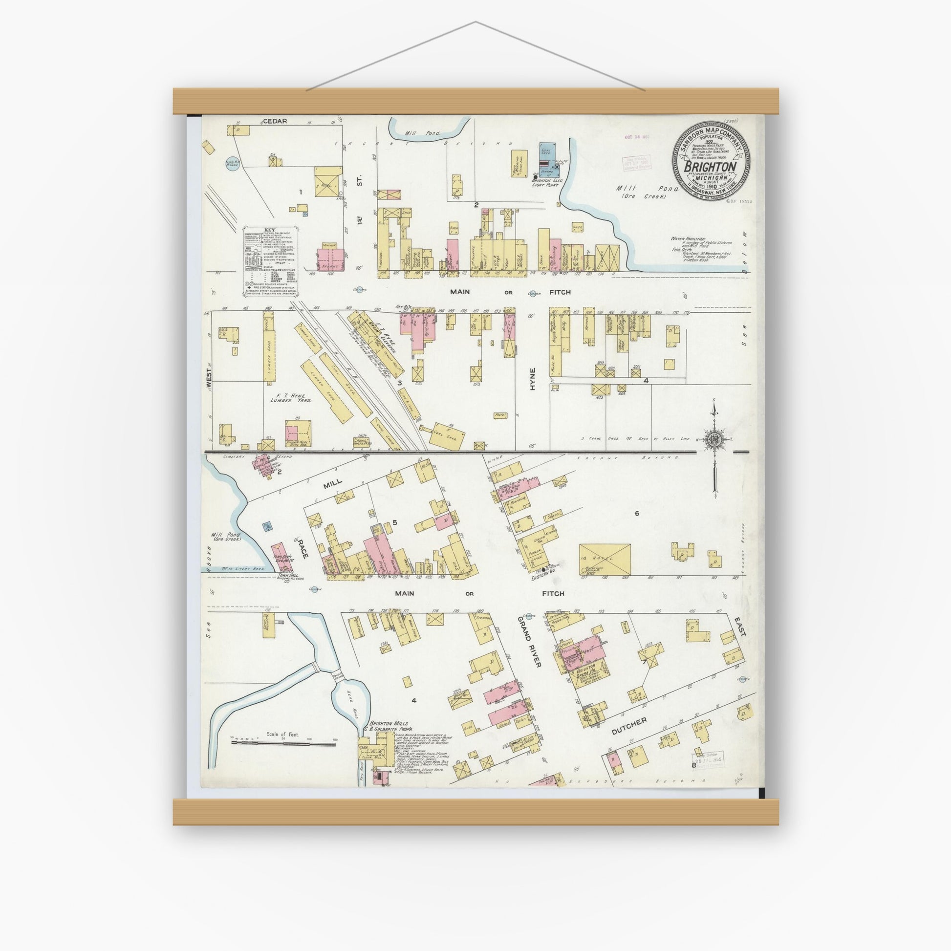 Old map wall art mockup — magnetic wood frame on white wall — Sanborn Fire Insurance Map from Brighton, Livingston County, Michigan (1910), Sheet #0001