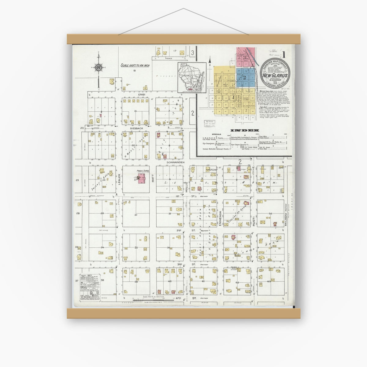 Old map wall art mockup — magnetic wood frame on white wall — Sanborn Fire Insurance Map from New Glarus, Green County, Wisconsin (1919) - Complete Map Set