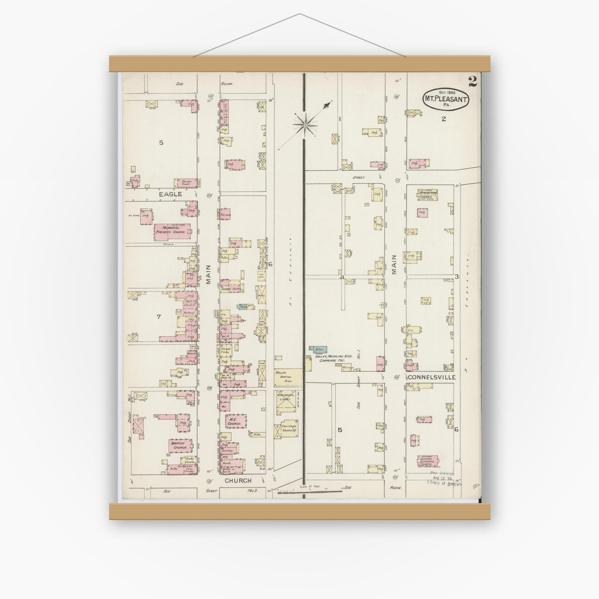 Old map wall art mockup — magnetic wood frame on white wall — Sanborn Fire Insurance Map from Mount Pleasant, Westmoreland County, Pennsylvania (1886), Sheet #0002