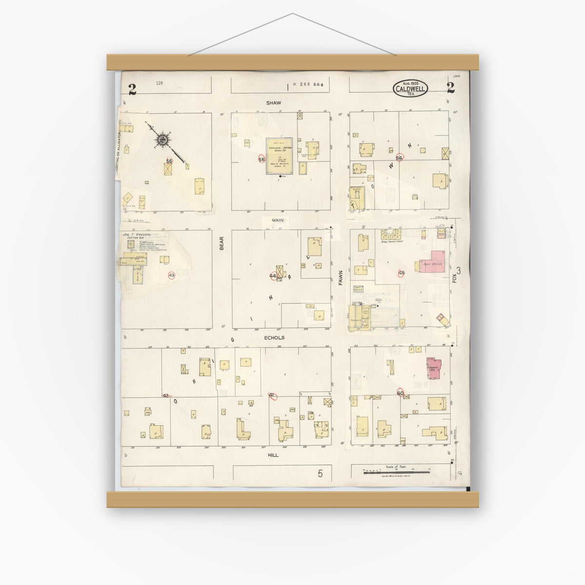 Old map wall art mockup — magnetic wood frame on white wall — Sanborn Fire Insurance Map from Caldwell, Burleson County, Texas (1943), Sheet #0002