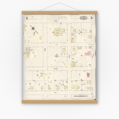 Old map wall art mockup — magnetic wood frame on white wall — Sanborn Fire Insurance Map from Caldwell, Burleson County, Texas (1943), Sheet #0002