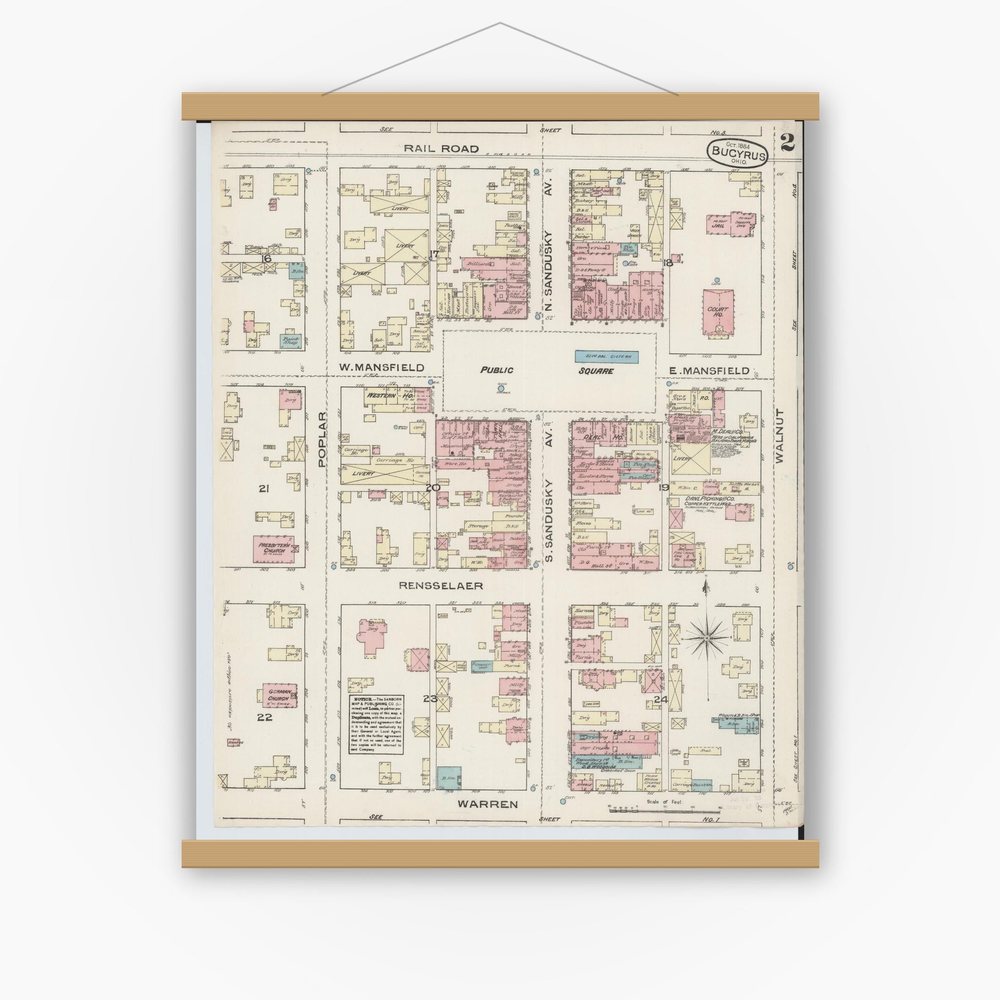 Old map wall art mockup — magnetic wood frame on white wall — Sanborn Fire Insurance Map from Bucyrus, Crawford County, Ohio (1884), Sheet #0002