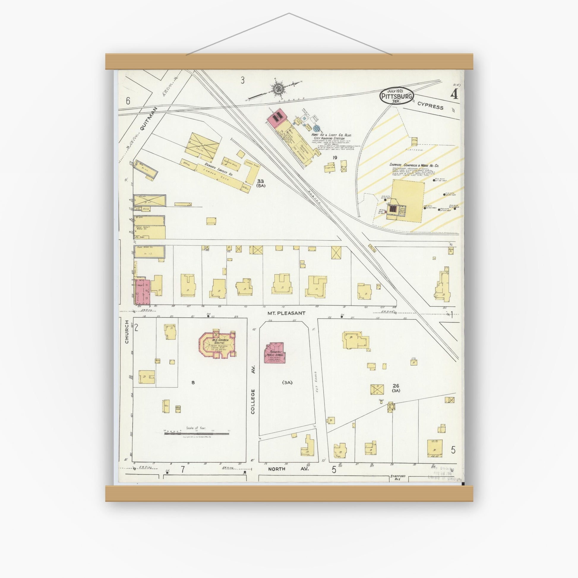 Old map wall art mockup — magnetic wood frame on white wall — Sanborn Fire Insurance Map from Pittsburg, Camp County, Texas (1921), Sheet #0004