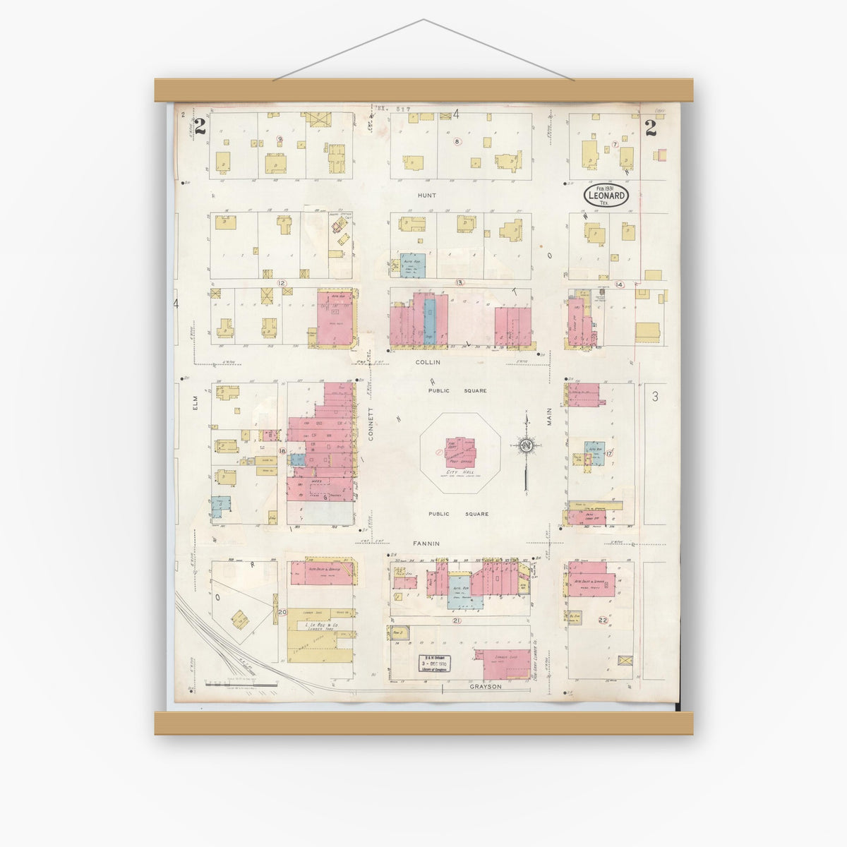 Old map wall art mockup — magnetic wood frame on white wall — Sanborn Fire Insurance Map from Leonard, Fannin County, Texas (1945), Sheet #0002