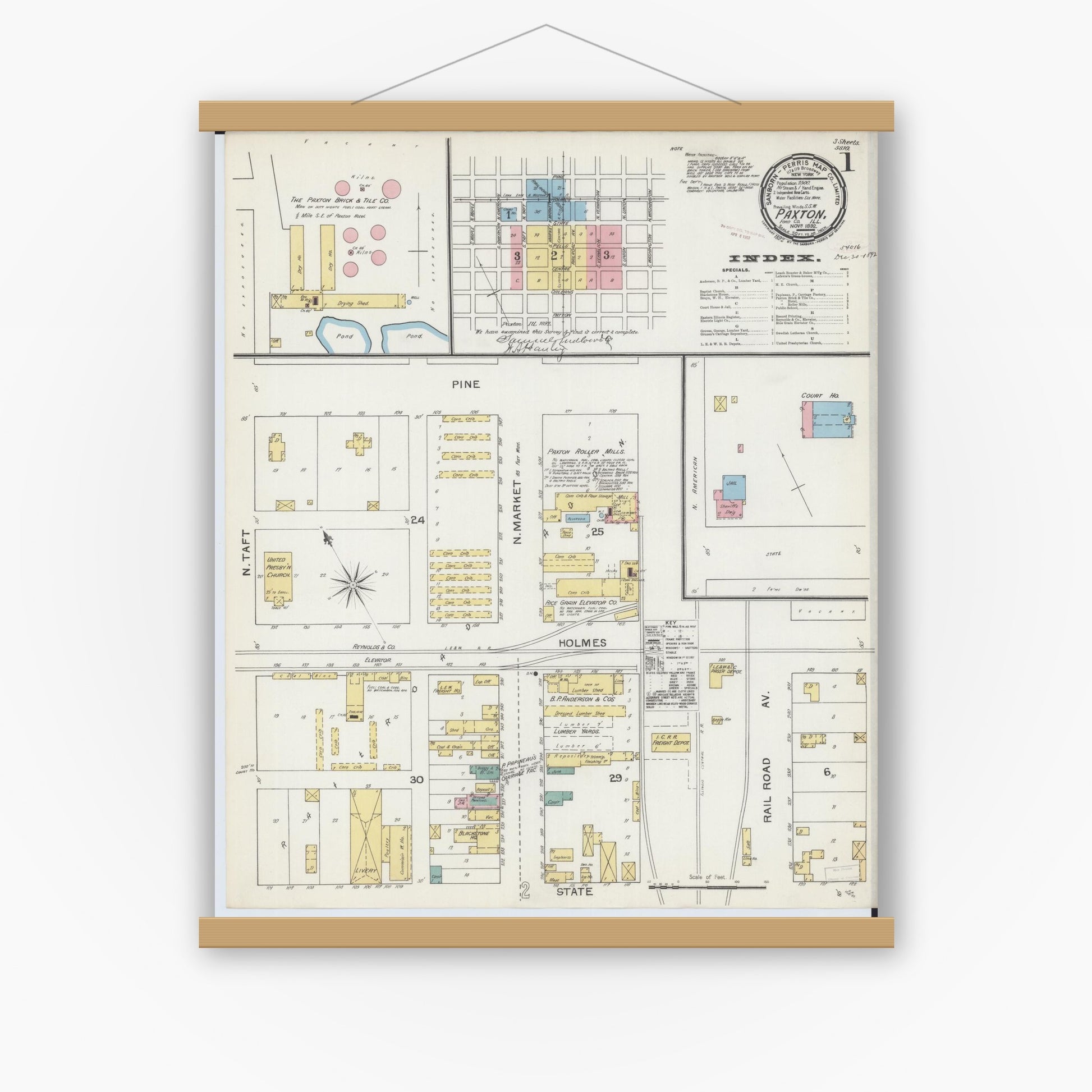 Old map wall art mockup — magnetic wood frame on white wall — Sanborn Fire Insurance Map from Paxton, Ford County, Illinois (1892) - Complete Map Set