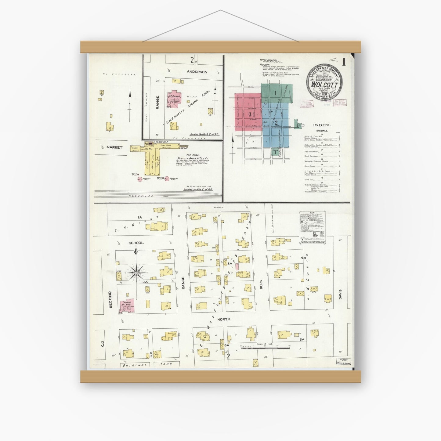 Old map wall art mockup — magnetic wood frame on white wall — Sanborn Fire Insurance Map from Wolcott, White County, Indiana (1909) - Complete Map Set