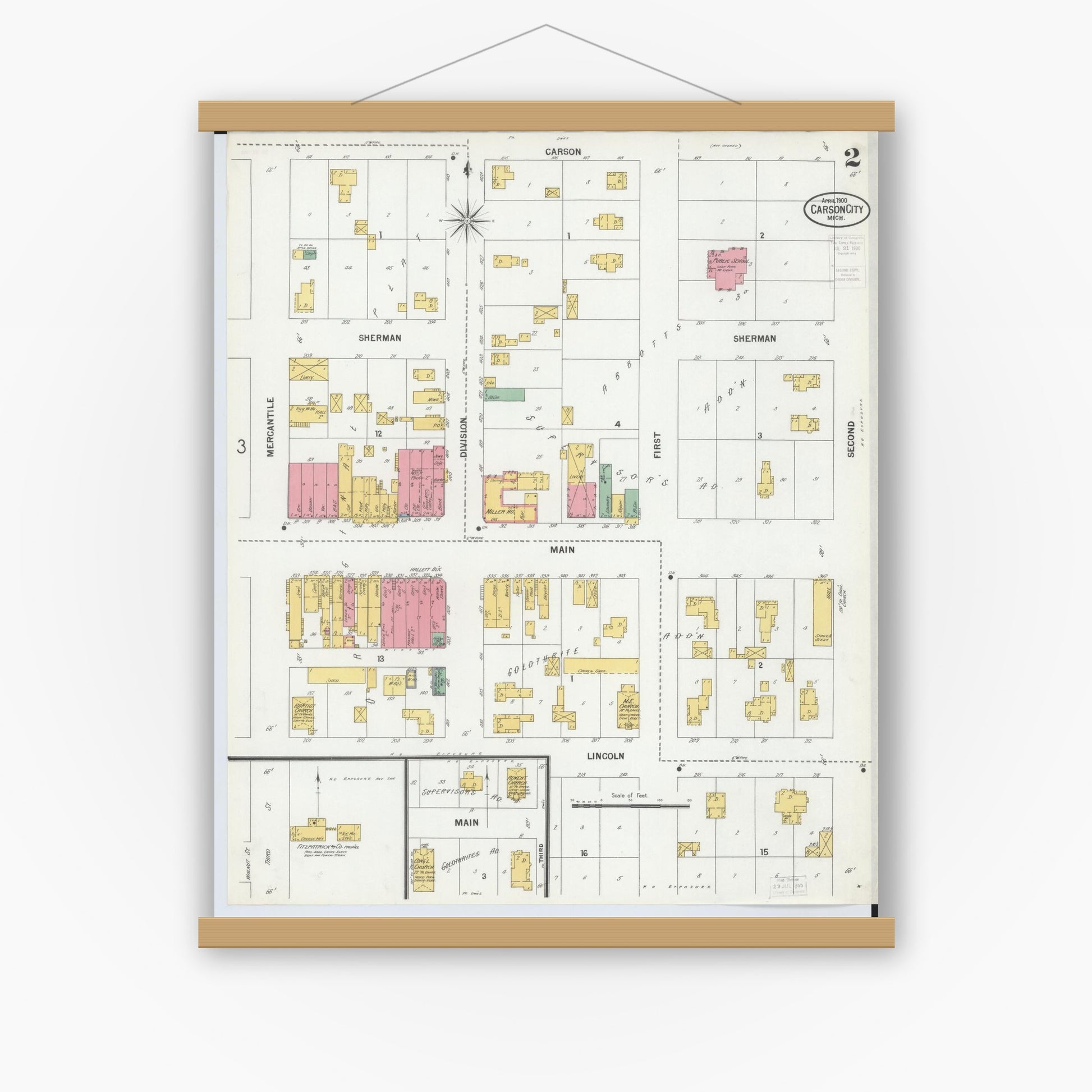 Old map wall art mockup — magnetic wood frame on white wall — Sanborn Fire Insurance Map from Carson City, Montcalm County, Michigan (1900), Sheet #0002