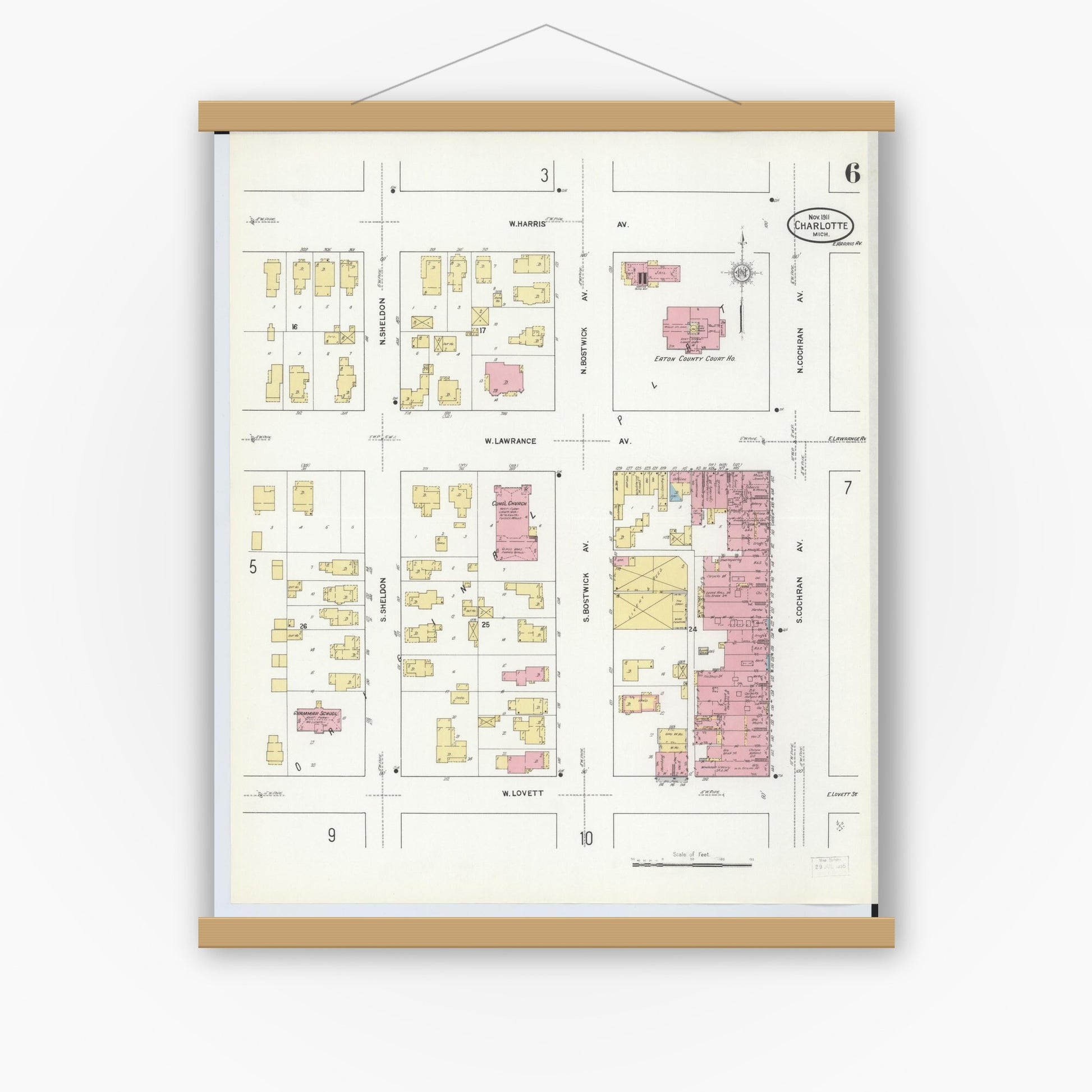 Old map wall art mockup — magnetic wood frame on white wall — Sanborn Fire Insurance Map from Charlotte, Eaton County, Michigan (1911), Sheet #0006