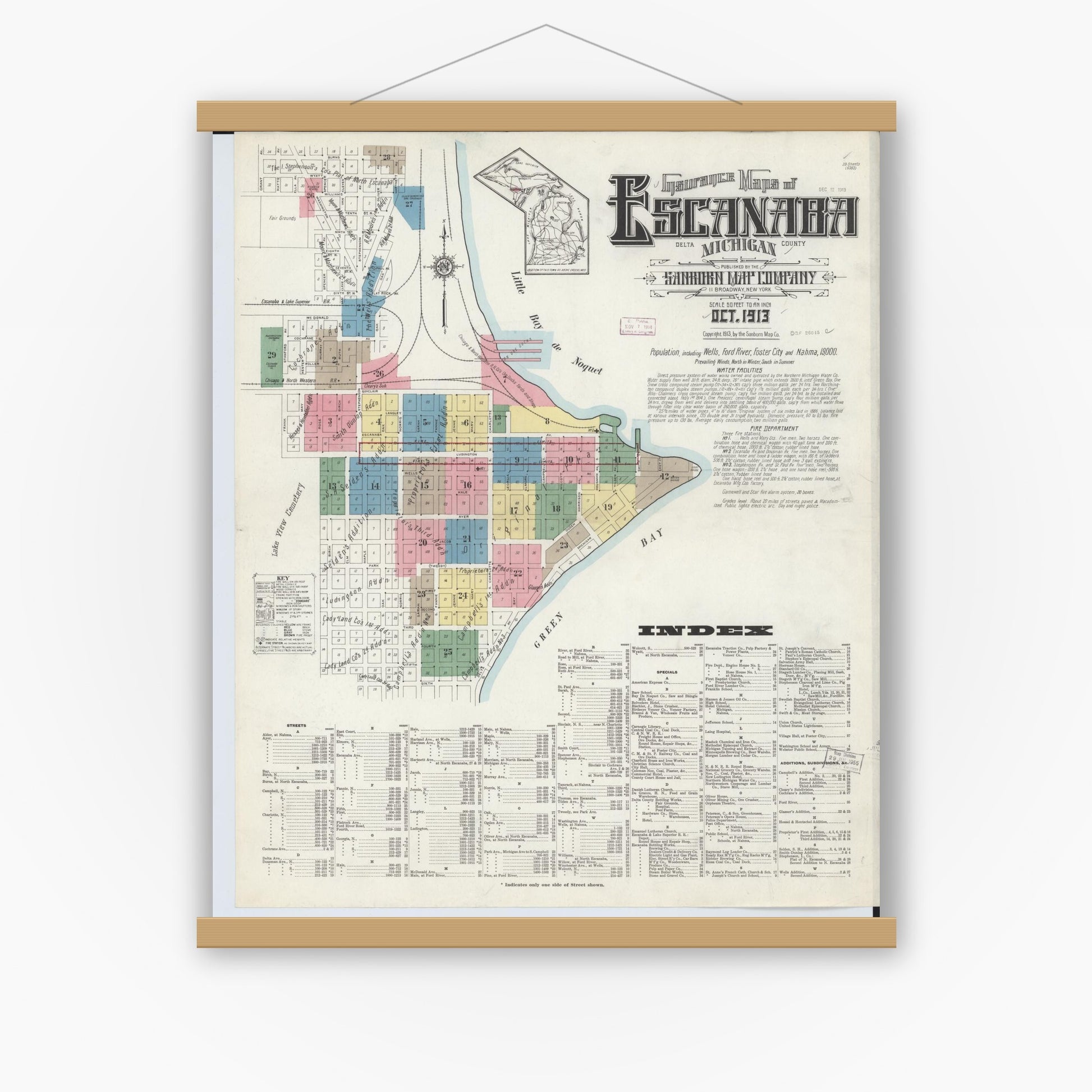 Old map wall art mockup — magnetic wood frame on white wall — Sanborn Fire Insurance Map from Escanaba, Delta County, Michigan (1913) - Complete Map Set