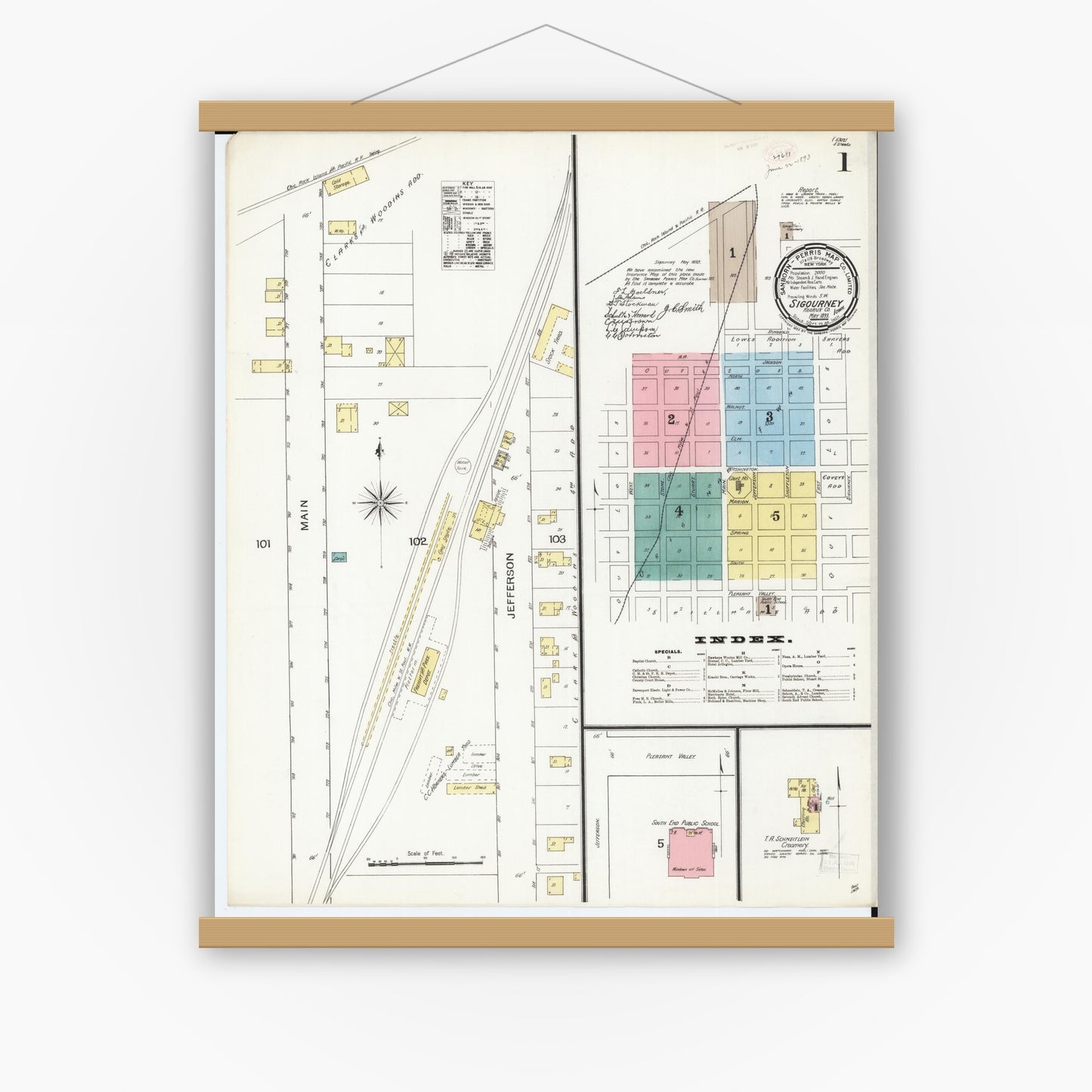 Old map wall art mockup — magnetic wood frame on white wall — Sanborn Fire Insurance Map from Sigourney, Kiokuk County, Iowa (1893), Sheet #0001