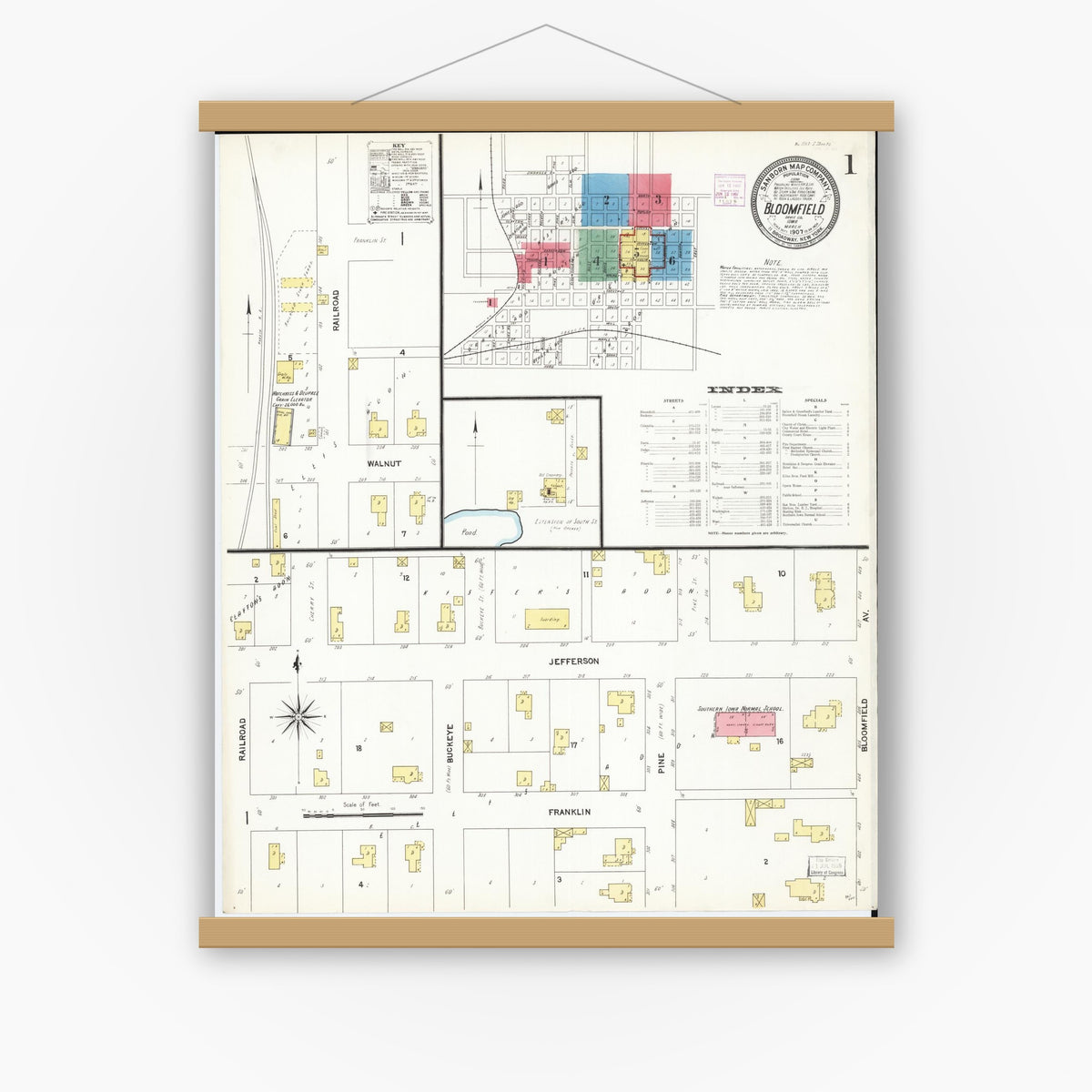 Old map wall art mockup — magnetic wood frame on white wall — Sanborn Fire Insurance Map from Bloomfield, Davis County, Iowa (1907) â€” Complete Set