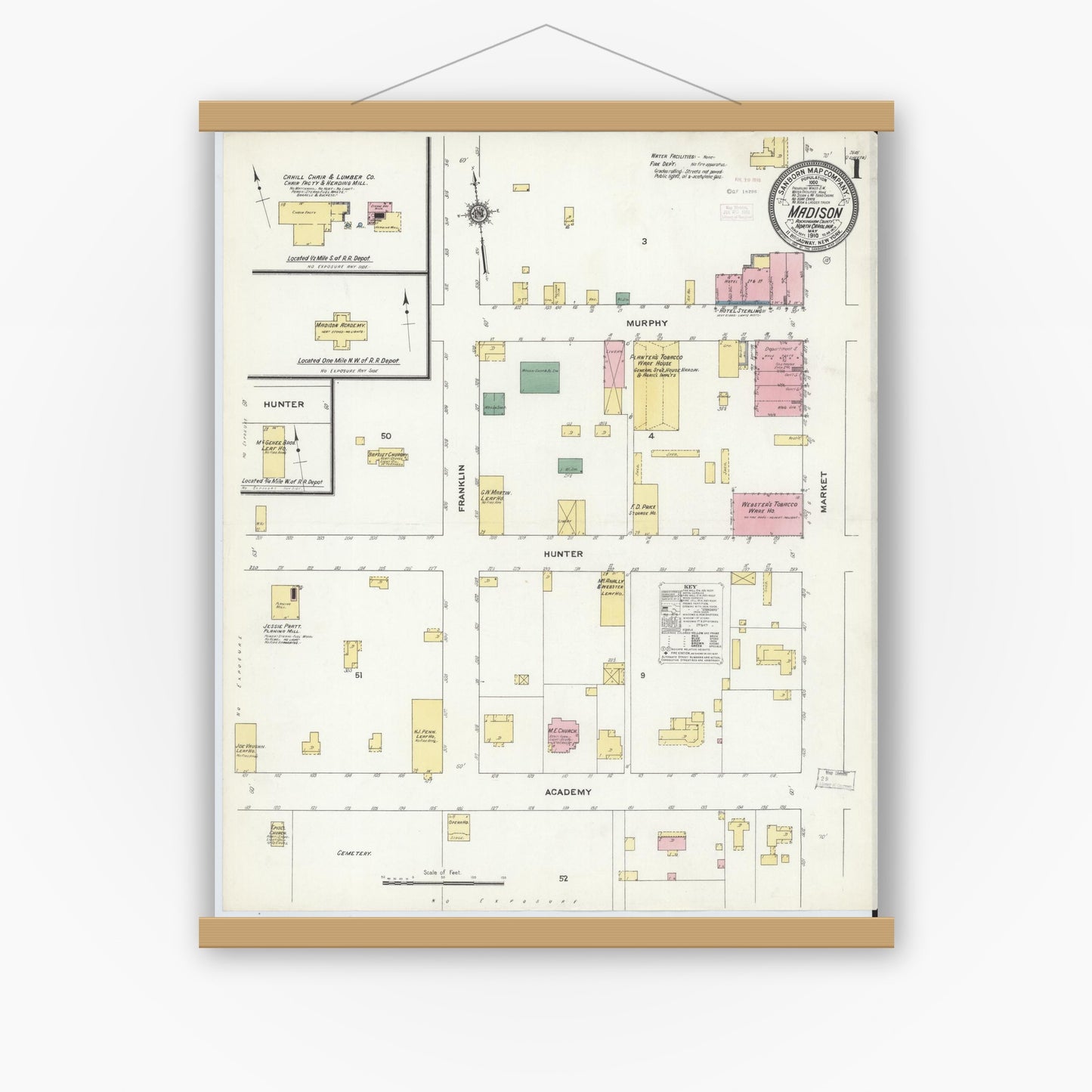 Old map wall art mockup — magnetic wood frame on white wall — Sanborn Fire Insurance Map from Madison, Rockingham County, North Carolina (1910) - Complete Map Set