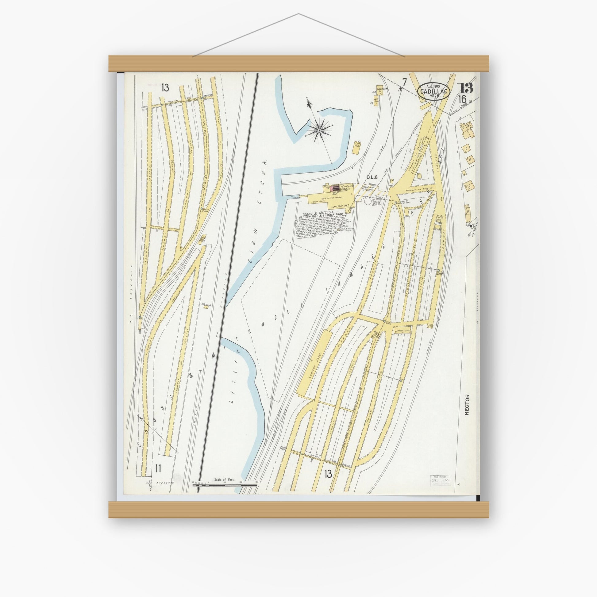 Old map wall art mockup — magnetic wood frame on white wall — Sanborn Fire Insurance Map from Cadillac, Wexford County, Michigan (1900), Sheet #0013