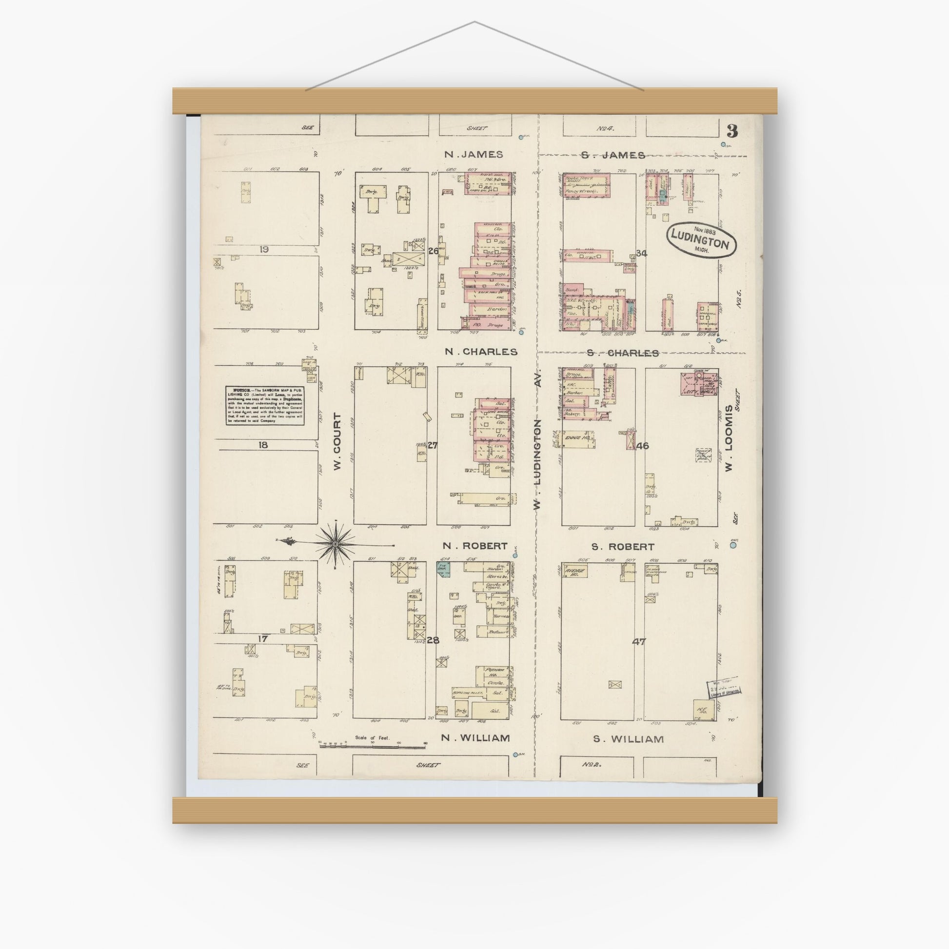 Old map wall art mockup — magnetic wood frame on white wall — Sanborn Fire Insurance Map from Ludington, Mason County, Michigan (1883), Sheet #0003