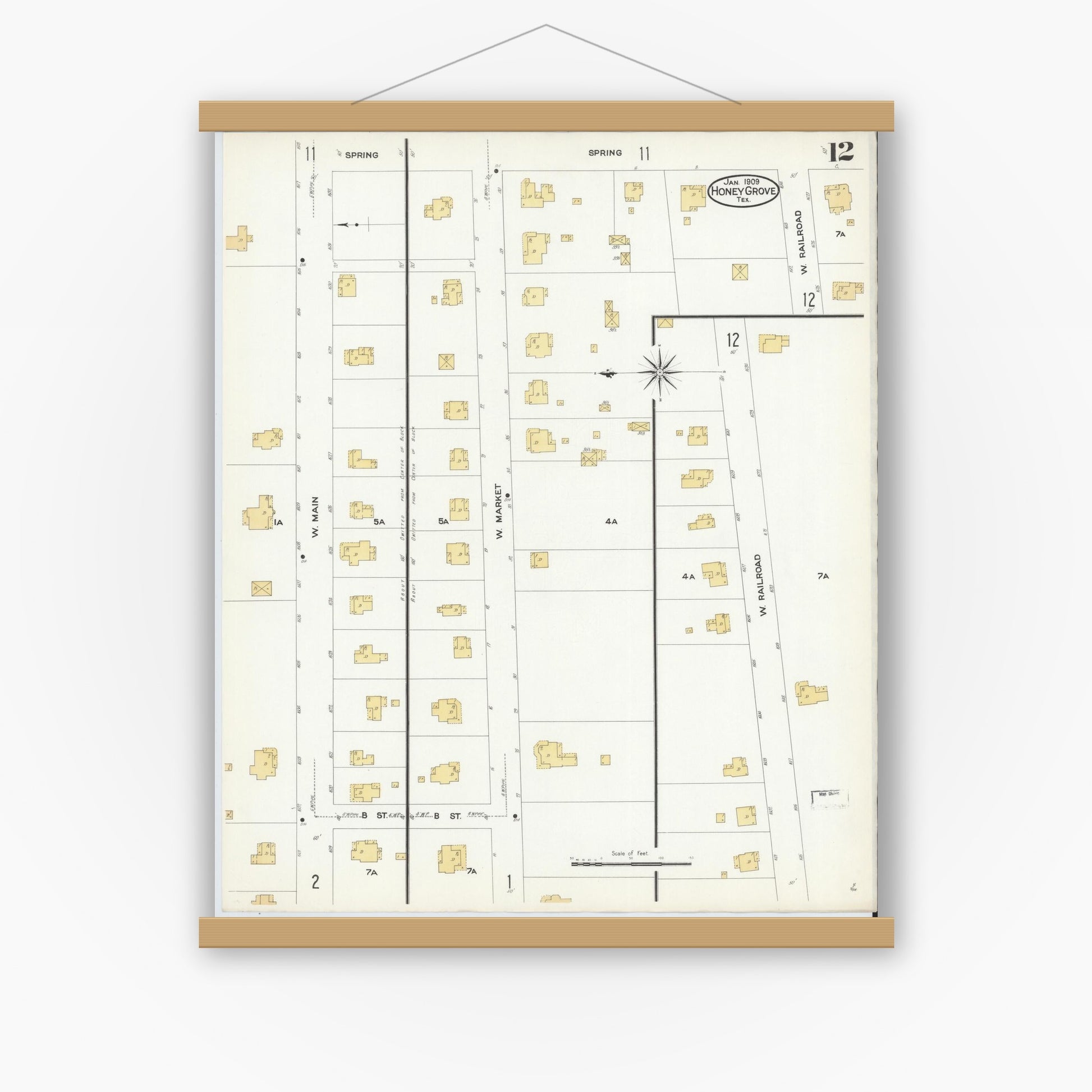 Old map wall art mockup — magnetic wood frame on white wall — Sanborn Fire Insurance Map from Honey Grove, Fannin County, Texas (1909), Sheet #0012