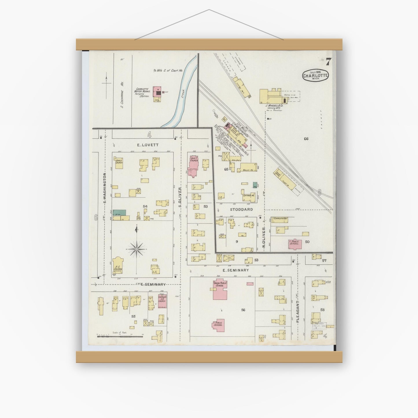 Old map wall art mockup — magnetic wood frame on white wall — Sanborn Fire Insurance Map from Charlotte, Eaton County, Michigan (1895), Sheet #0007