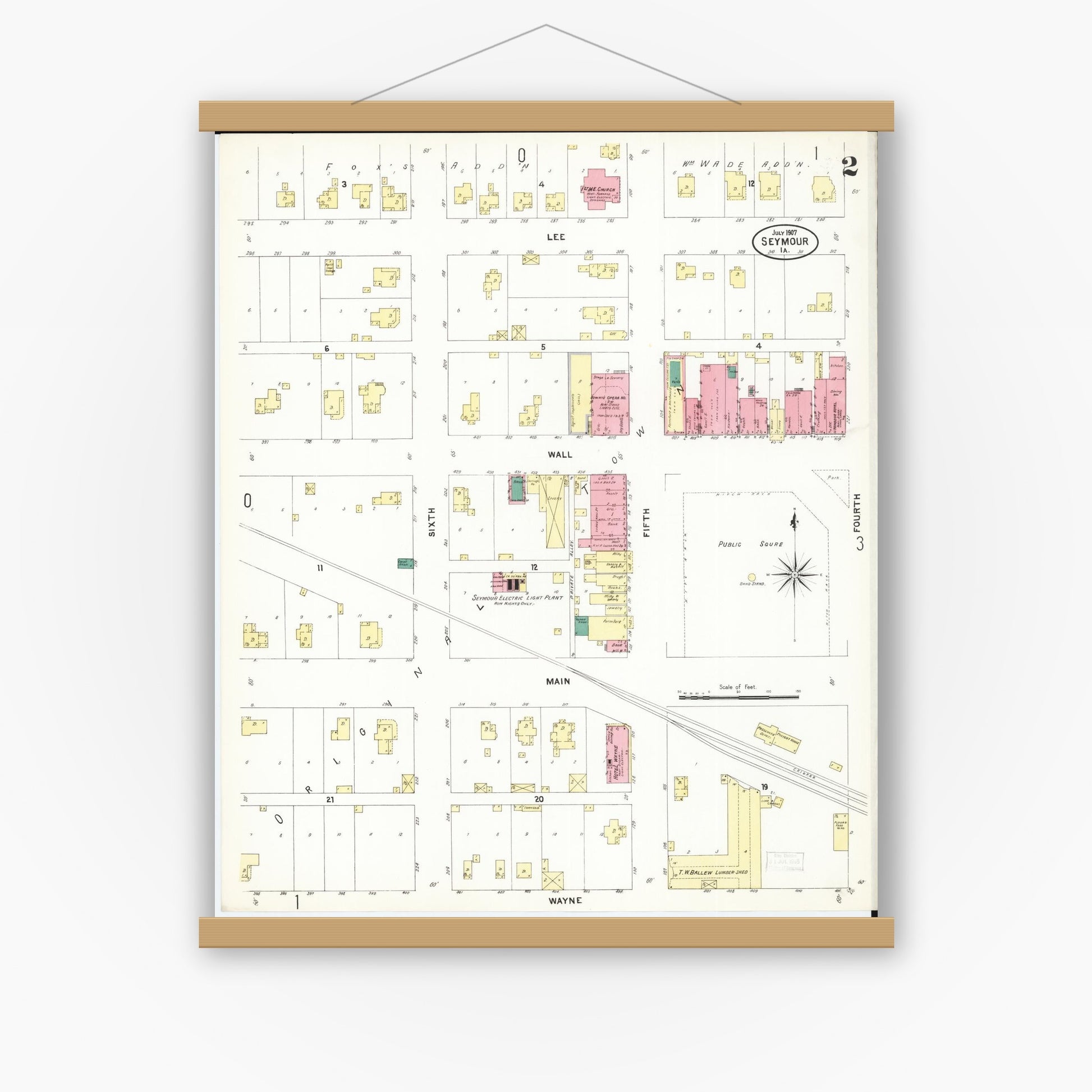 Old map wall art mockup — magnetic wood frame on white wall — Sanborn Fire Insurance Map from Seymour, Wayne County, Iowa (1907), Sheet #0002