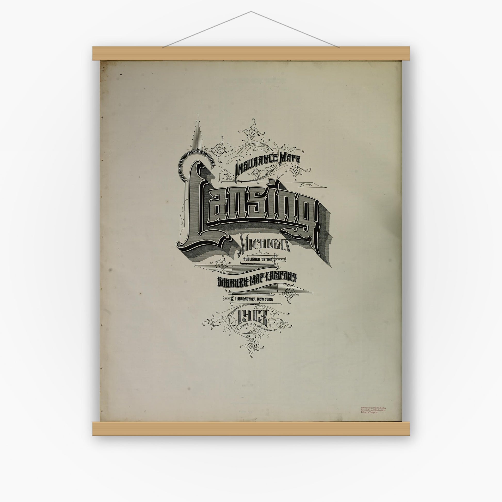 Old map wall art mockup — magnetic wood frame on white wall — Sanborn Fire Insurance Map from Lansing, Ingham County, Michigan (1913), Sheet #0001