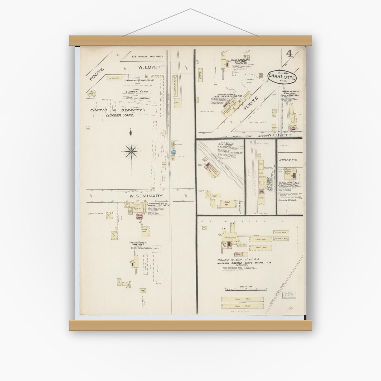 Old map wall art mockup — magnetic wood frame on white wall — Sanborn Fire Insurance Map from Charlotte, Eaton County, Michigan (1886), Sheet #0004