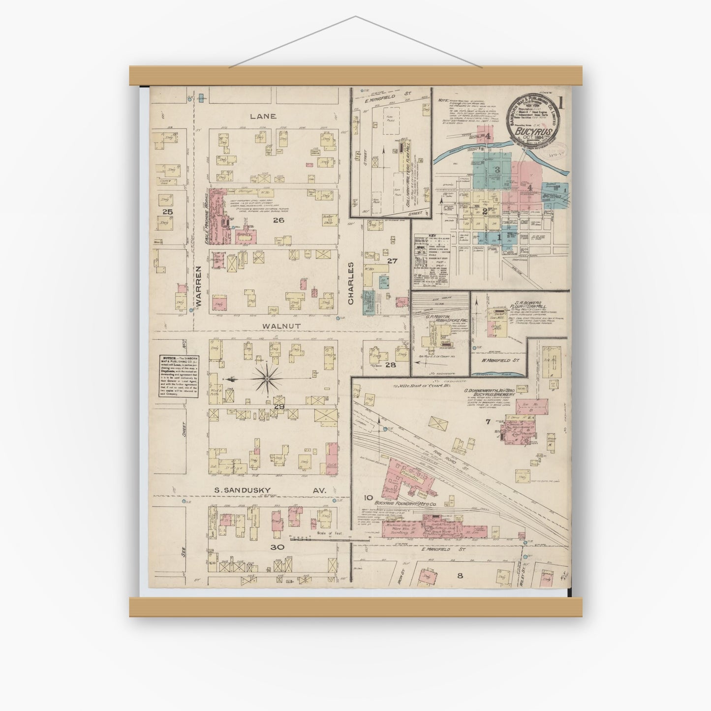 Old map wall art mockup — magnetic wood frame on white wall — Sanborn Fire Insurance Map from Bucyrus, Crawford County, Ohio (1884) - Complete Map Set