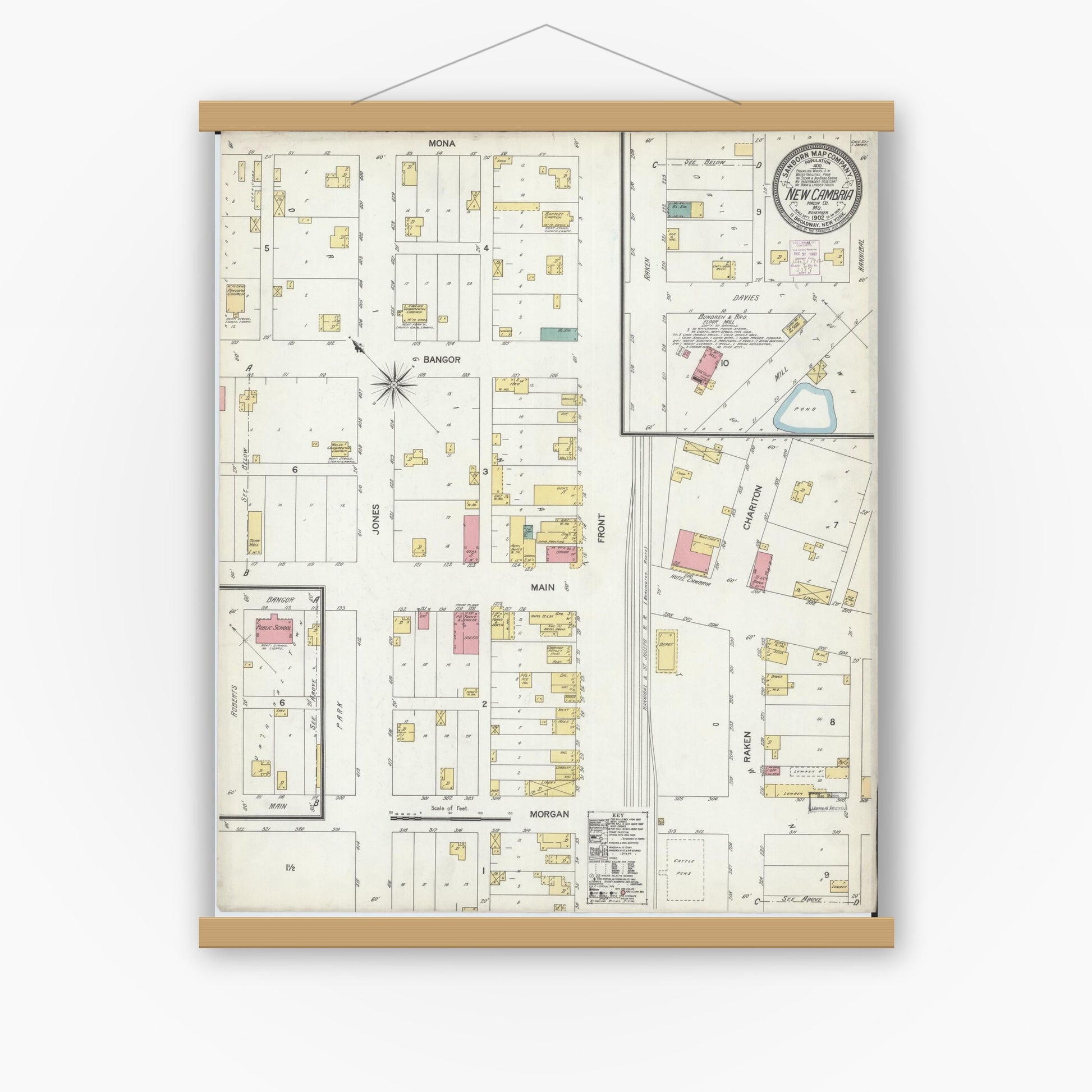 Old map wall art mockup — magnetic wood frame on white wall — Sanborn Fire Insurance Map from New Cambria, Macon County, Missouri (1892), Sheet #0001