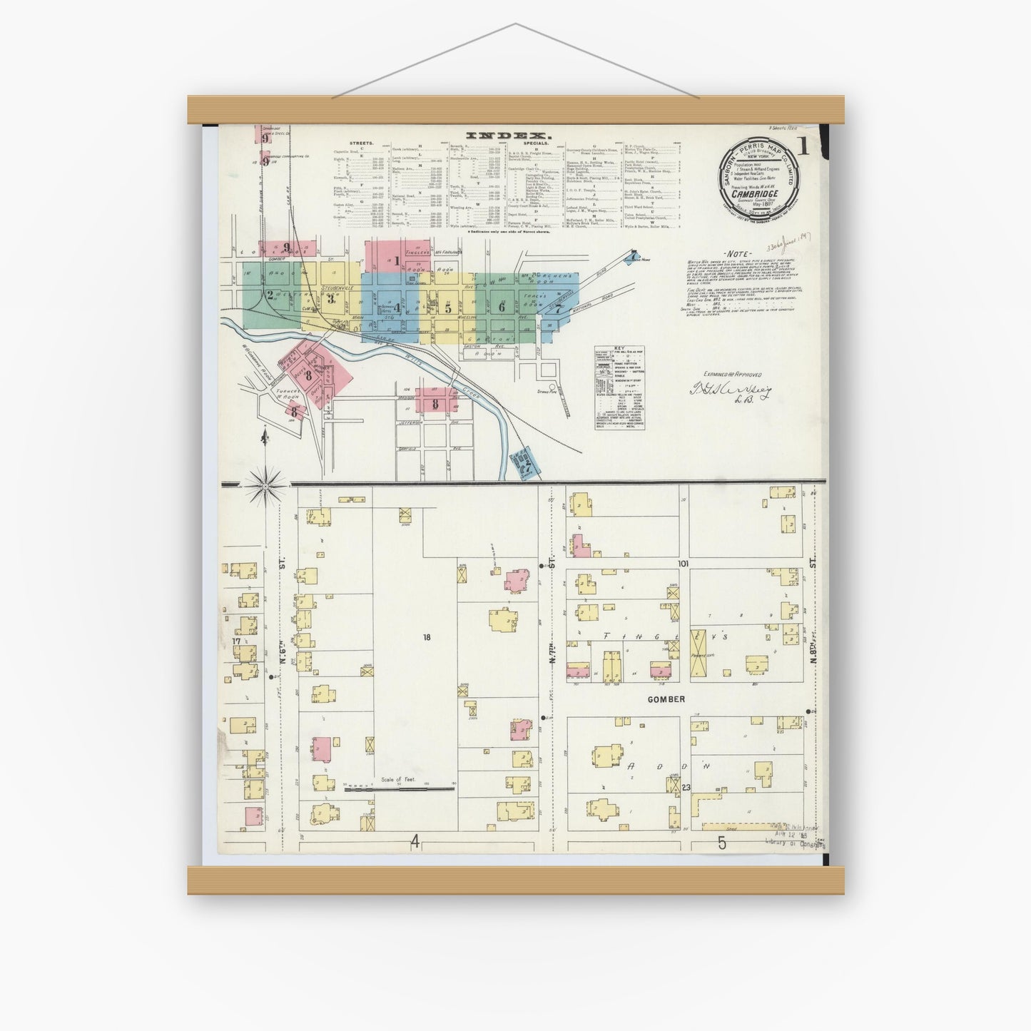 Old map wall art mockup — magnetic wood frame on white wall — Sanborn Fire Insurance Map from Cambridge, Guernsey County, Ohio (1897) - Complete Map Set