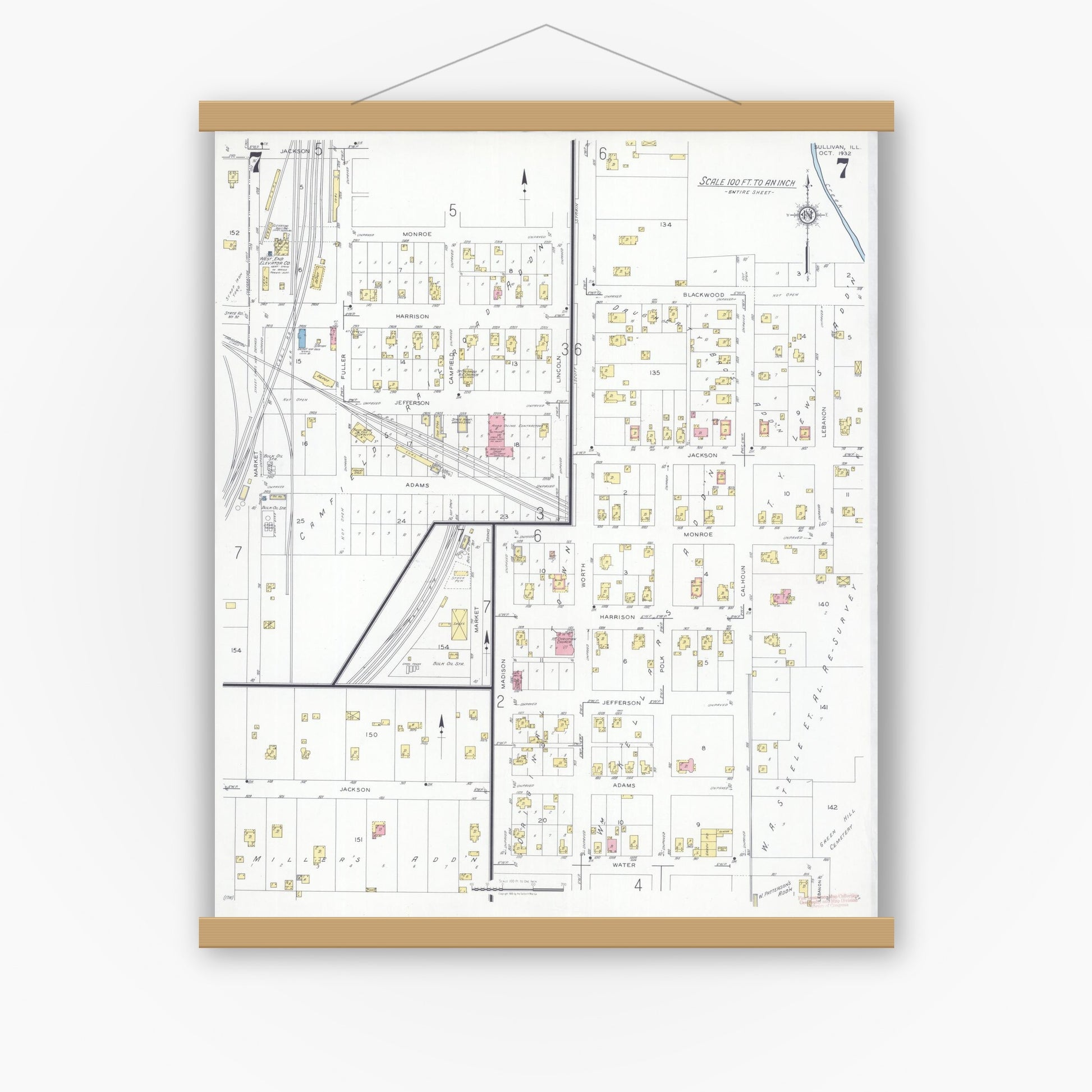 Old map wall art mockup — magnetic wood frame on white wall — Sanborn Fire Insurance Map from Sullivan, Moultrie County, Illinois (1932), Sheet #0007