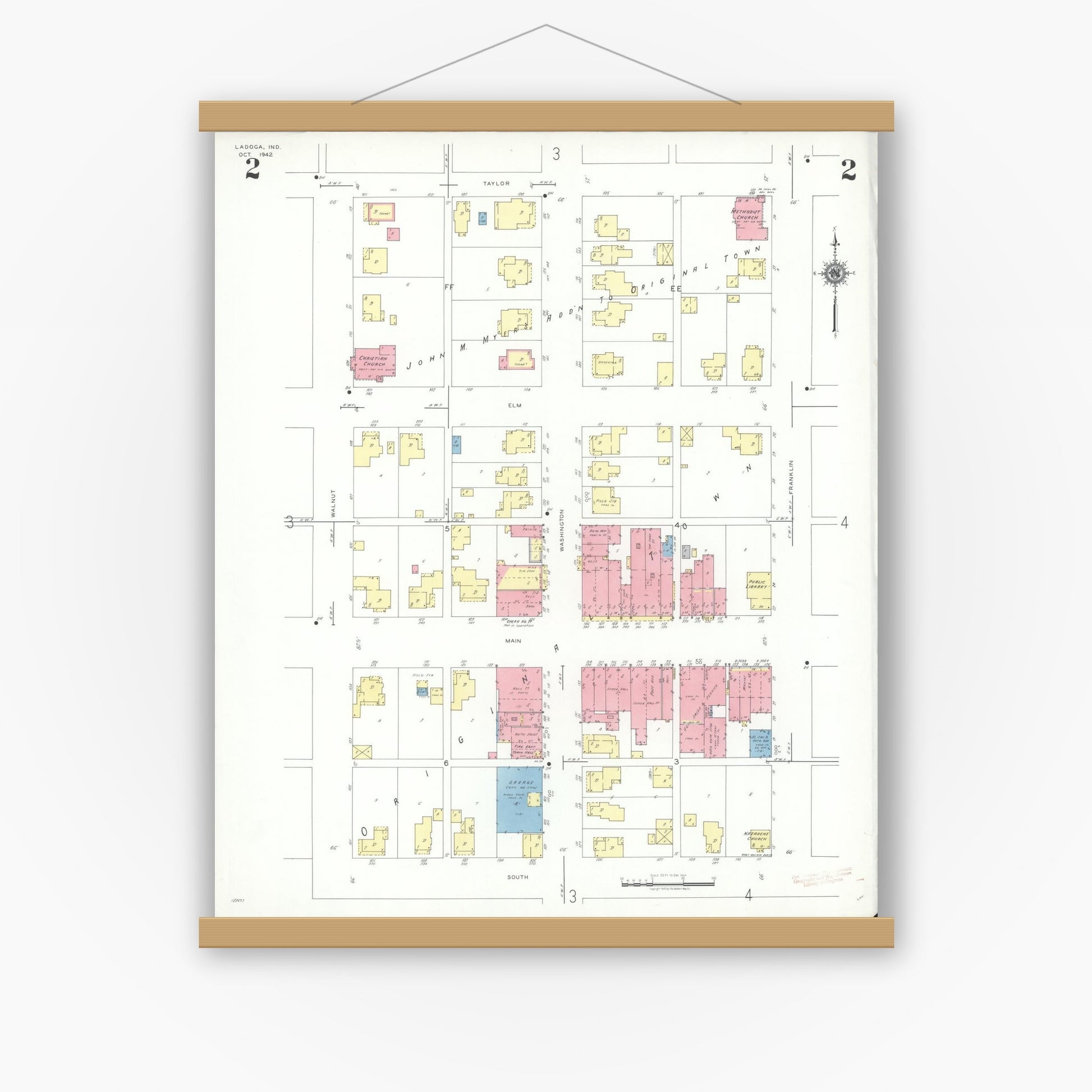 Old map wall art mockup — magnetic wood frame on white wall — Sanborn Fire Insurance Map from Ladoga, Montgomery County, Indiana (1942), Sheet #0002