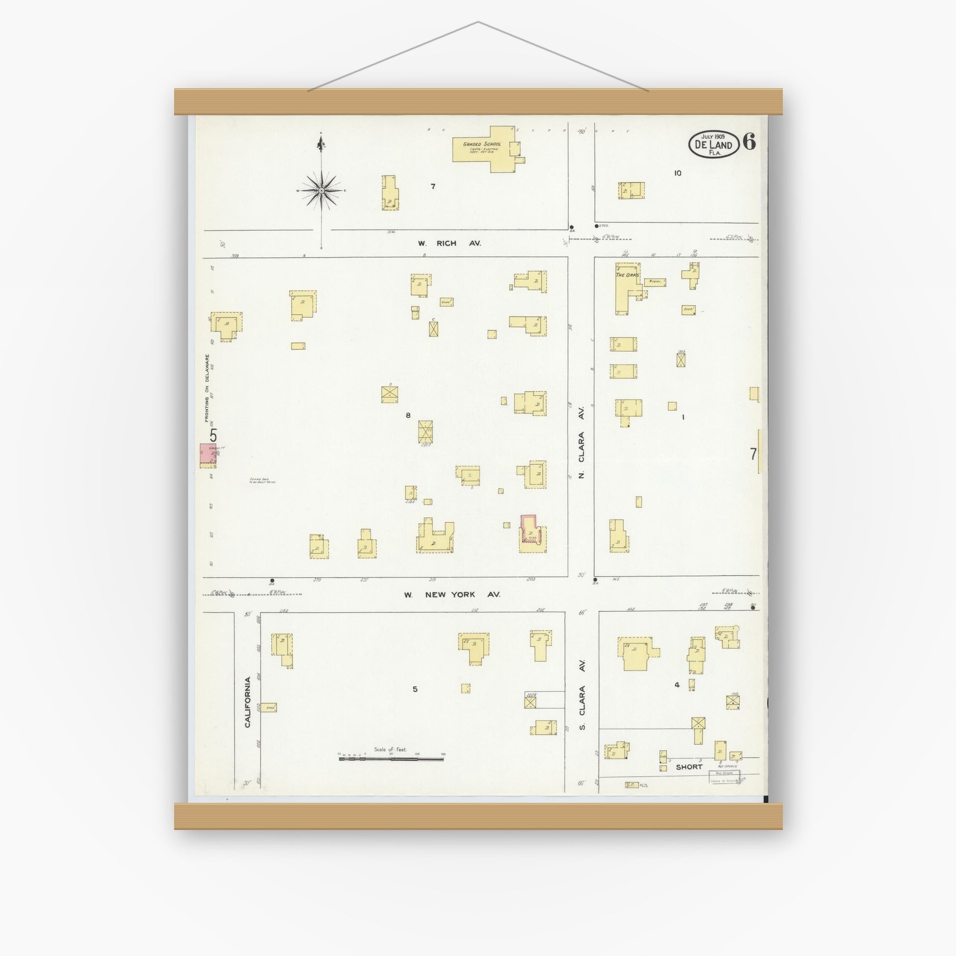 Old map wall art mockup — magnetic wood frame on white wall — Sanborn Fire Insurance Map from De Land, Volusia County, Florida (1909), Sheet #0006