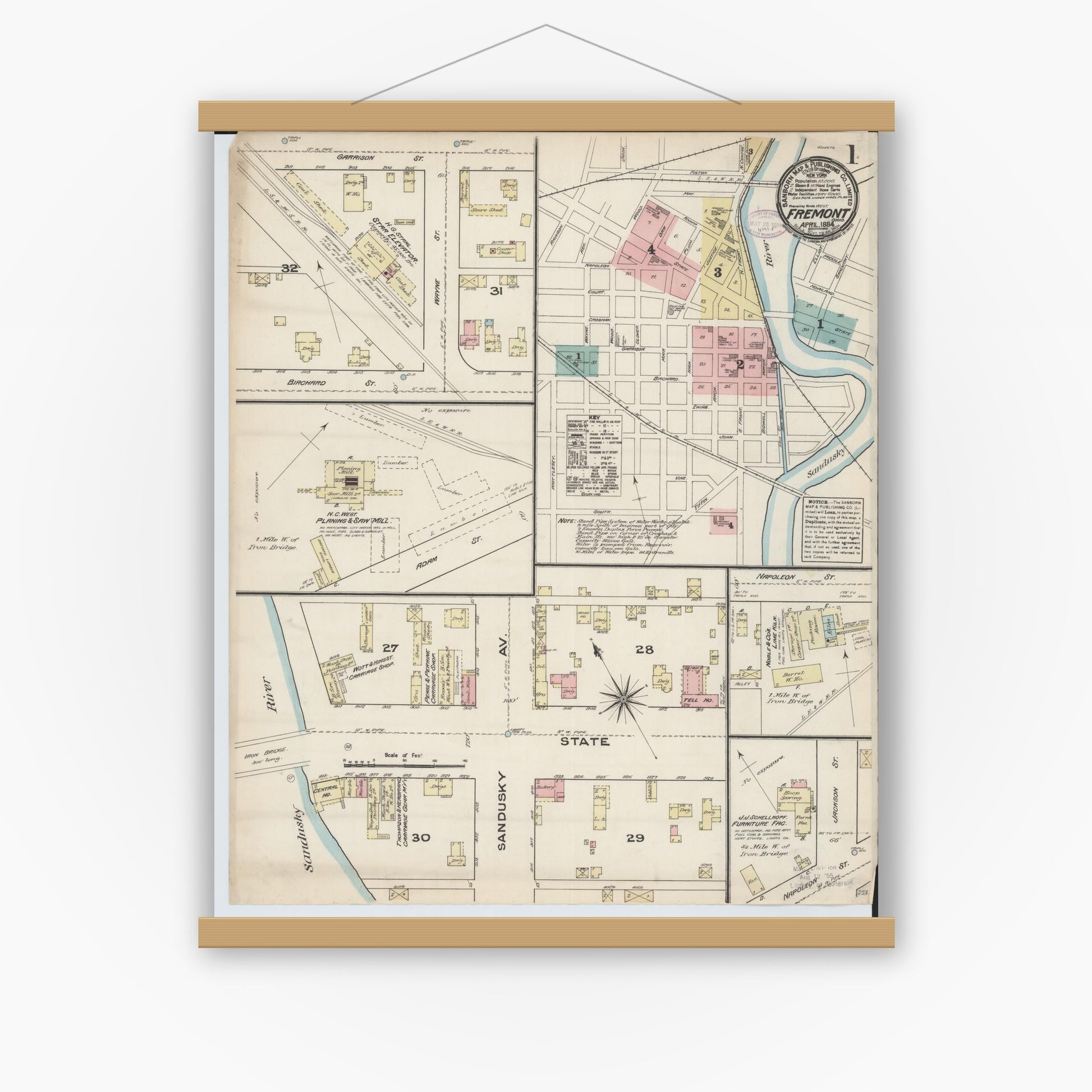 Old map wall art mockup — magnetic wood frame on white wall — Sanborn Fire Insurance Map from Fremont, Sandusky County, Ohio (1884), Sheet #0001